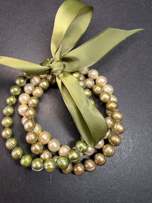 Set of three freshwater pearl shades of green stretch bracelets