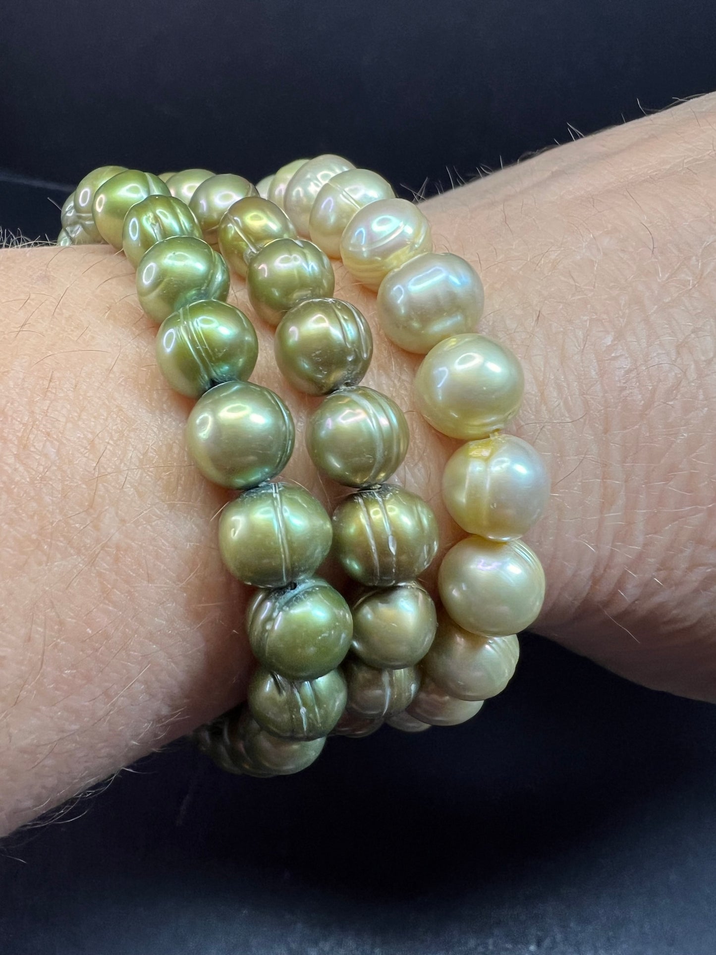 Set of three freshwater pearl shades of green stretch bracelets