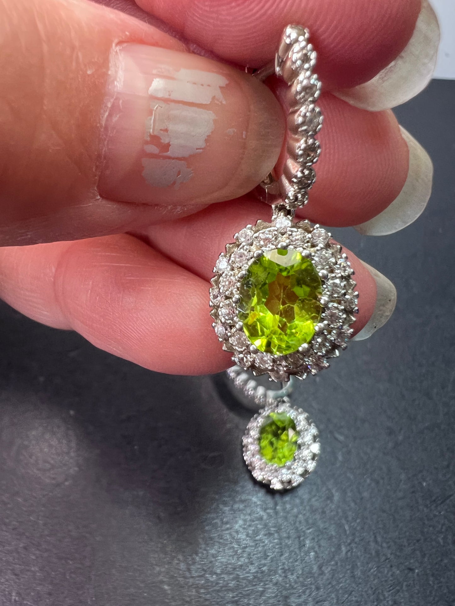 Manchurian Peridot and zircon drop halo earrings in rhodium over sterling silver 5.42 ctw
