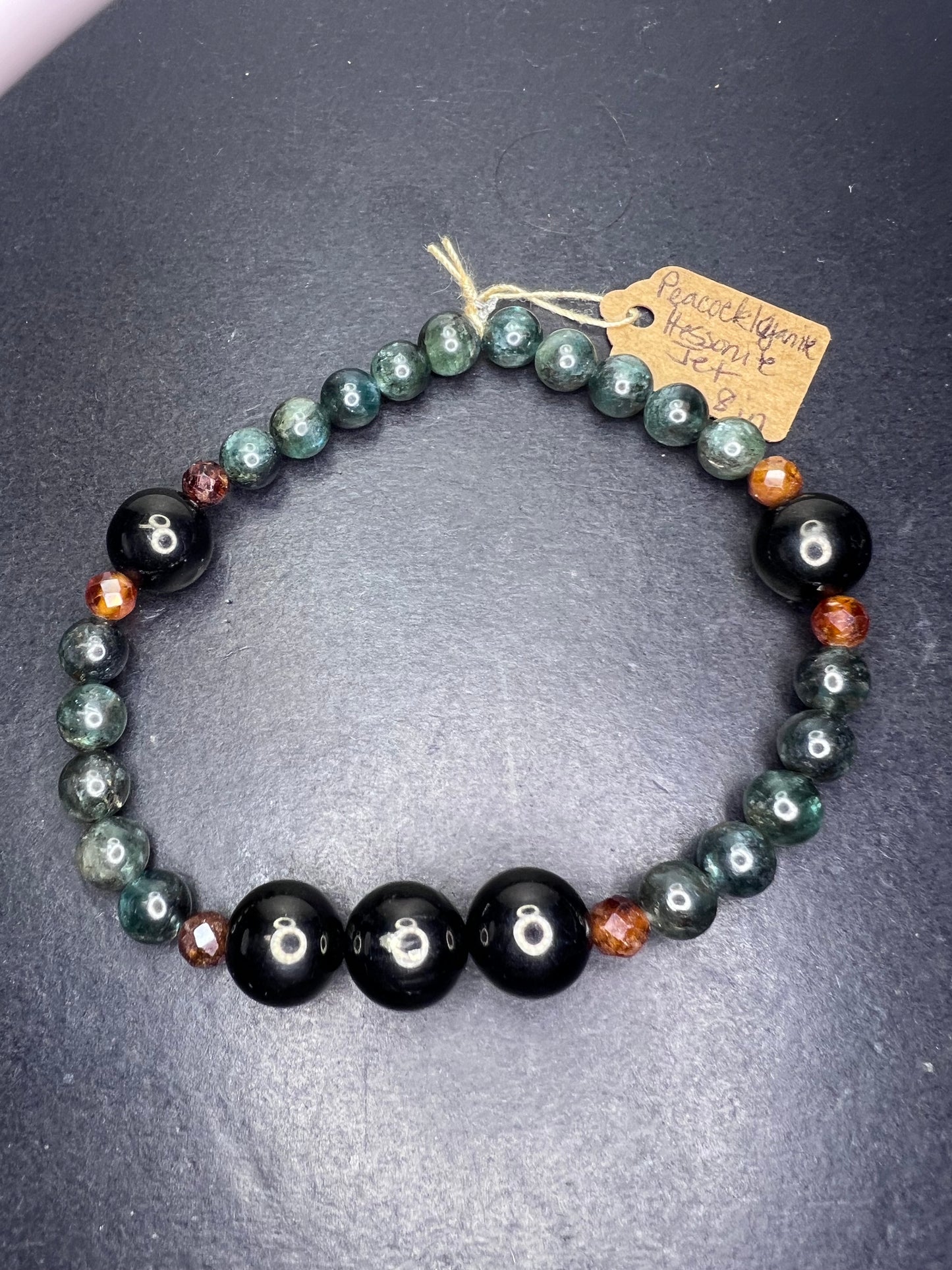 Peacock kyanite , Hessonite garnet, and jet stretch bracelet 8 inch