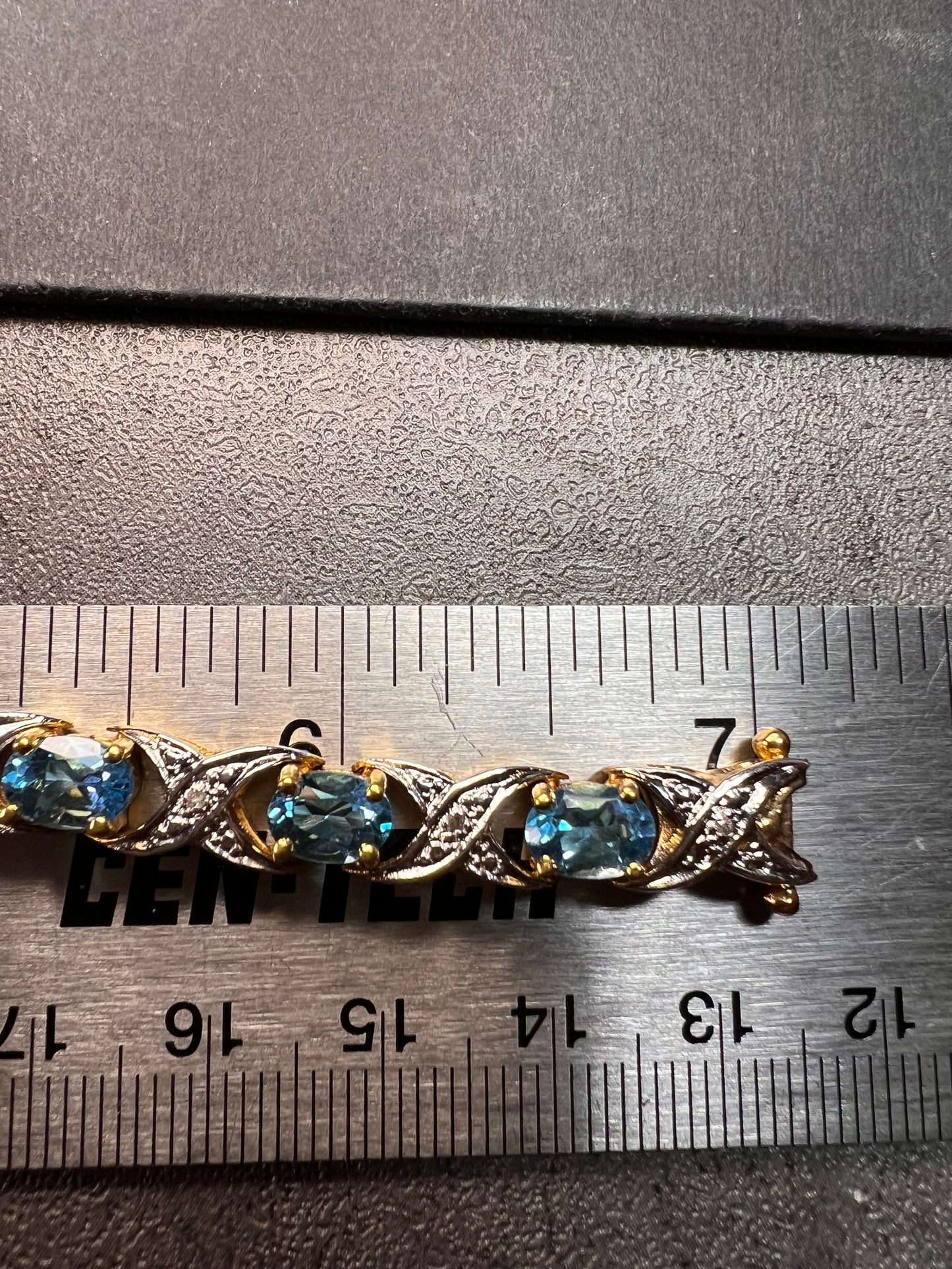 Vintage blue topaz and diamond gold over sterling silver tennis bracelet