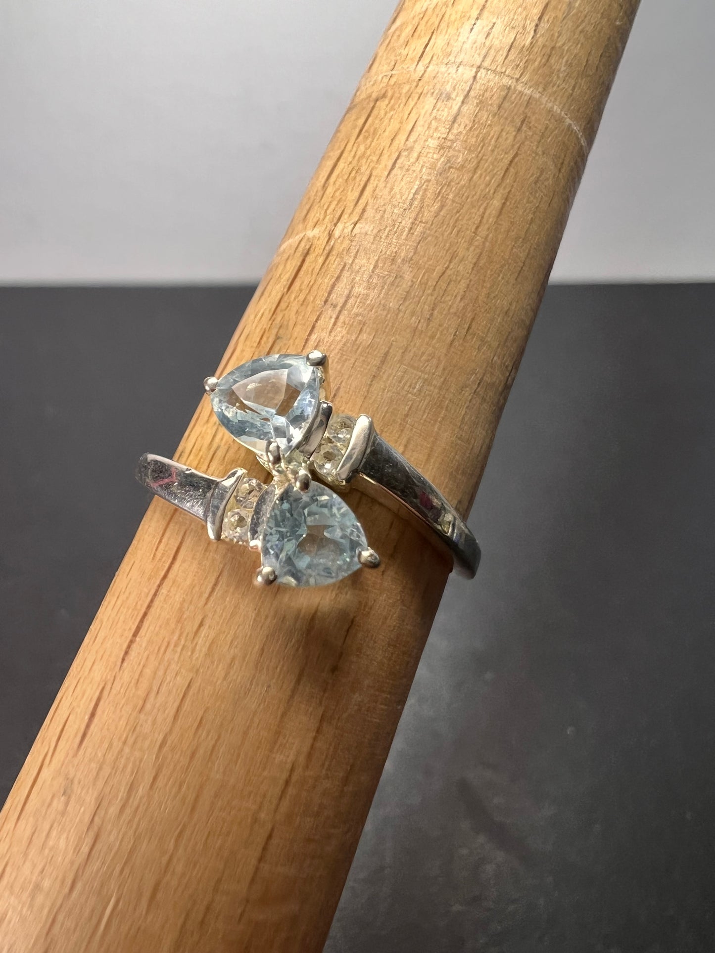 Trillium cut blue topaz bypass ring in rhodium over sterling silver size 9