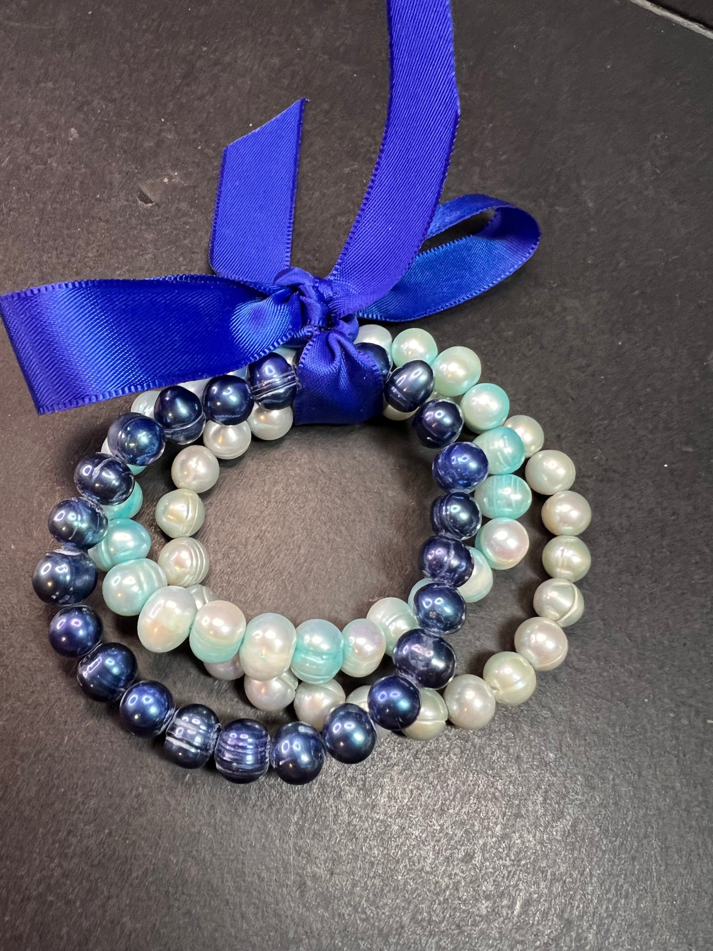 Set of three freshwater pearl shades of blue stretch bracelets