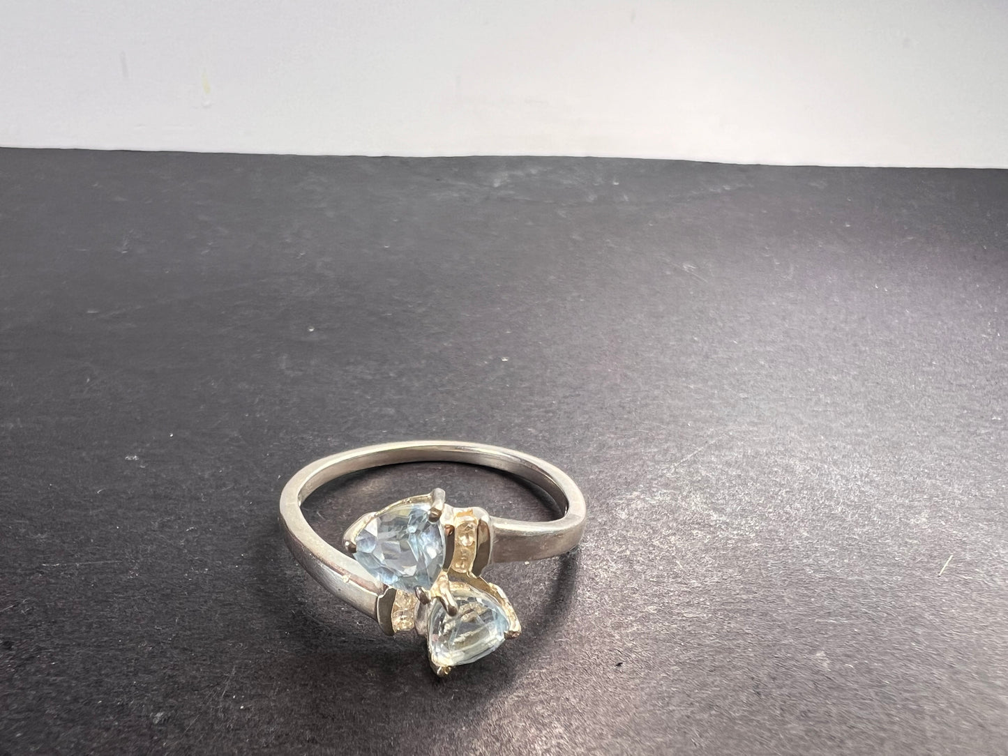 Trillium cut blue topaz bypass ring in rhodium over sterling silver size 9