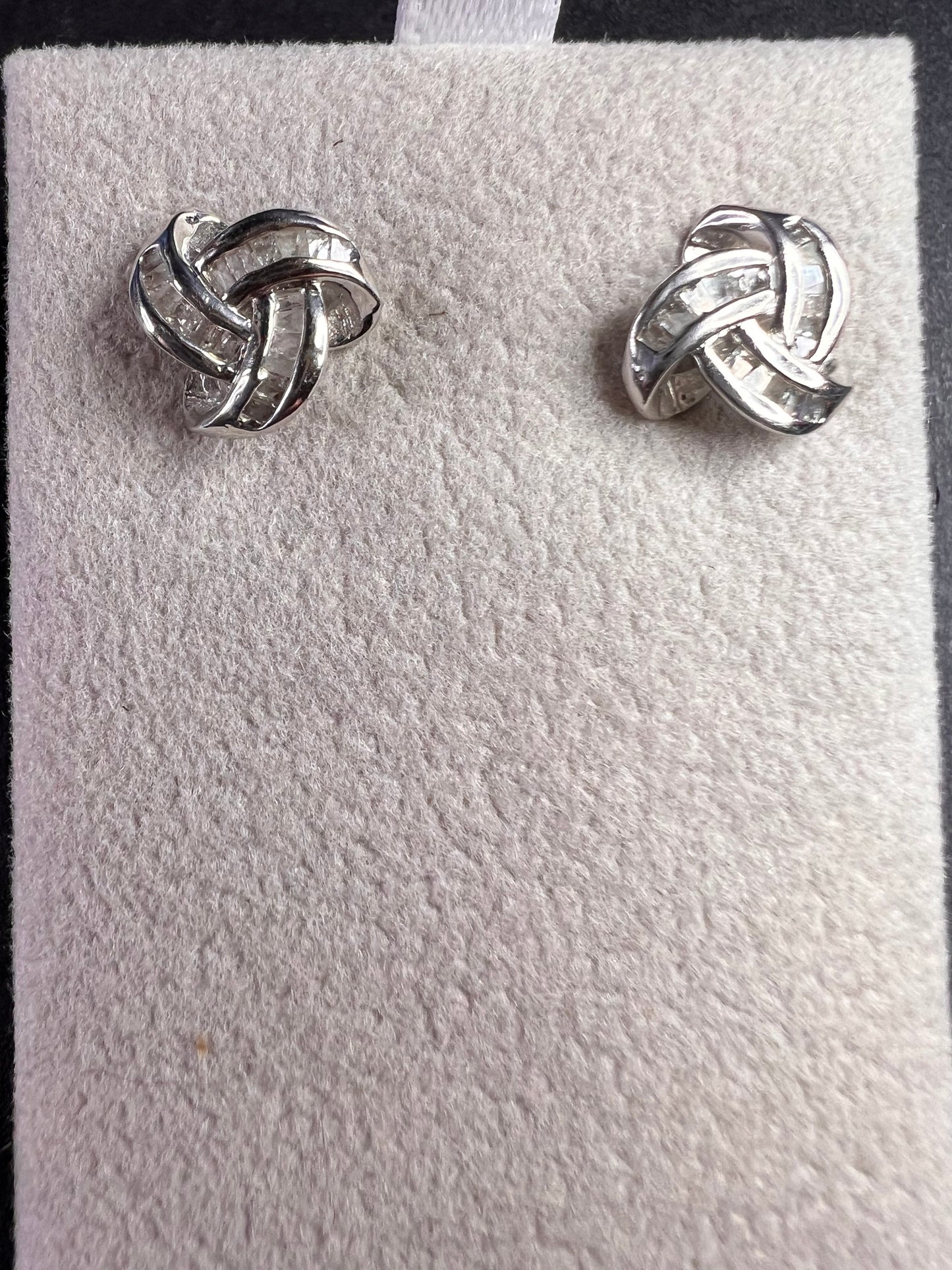 Diamond Celtic knot earrings in platinum over sterling silver .25ctw