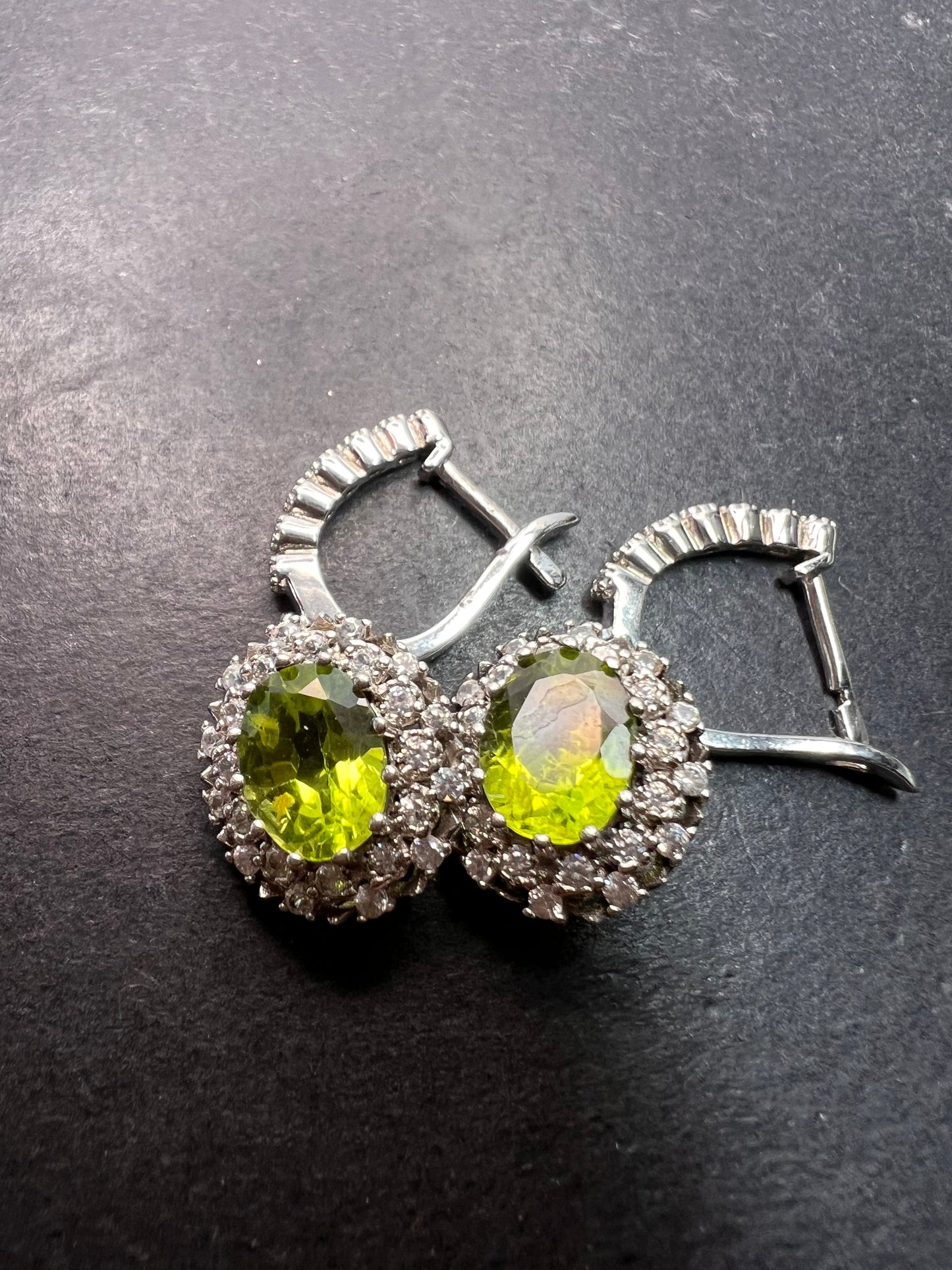 Manchurian Peridot and zircon drop halo earrings in rhodium over sterling silver 5.42 ctw