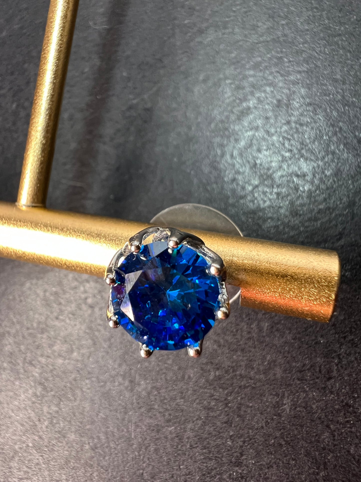 YGI blue CZ rhodium over sterling silver solitaire stud earrings