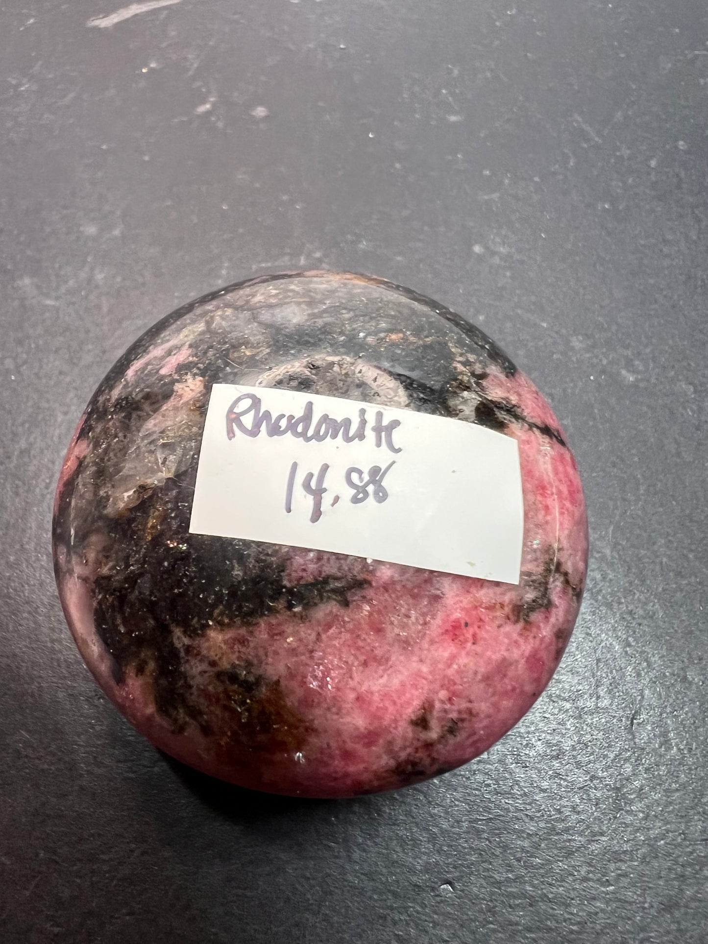 Rhodonite palm stone