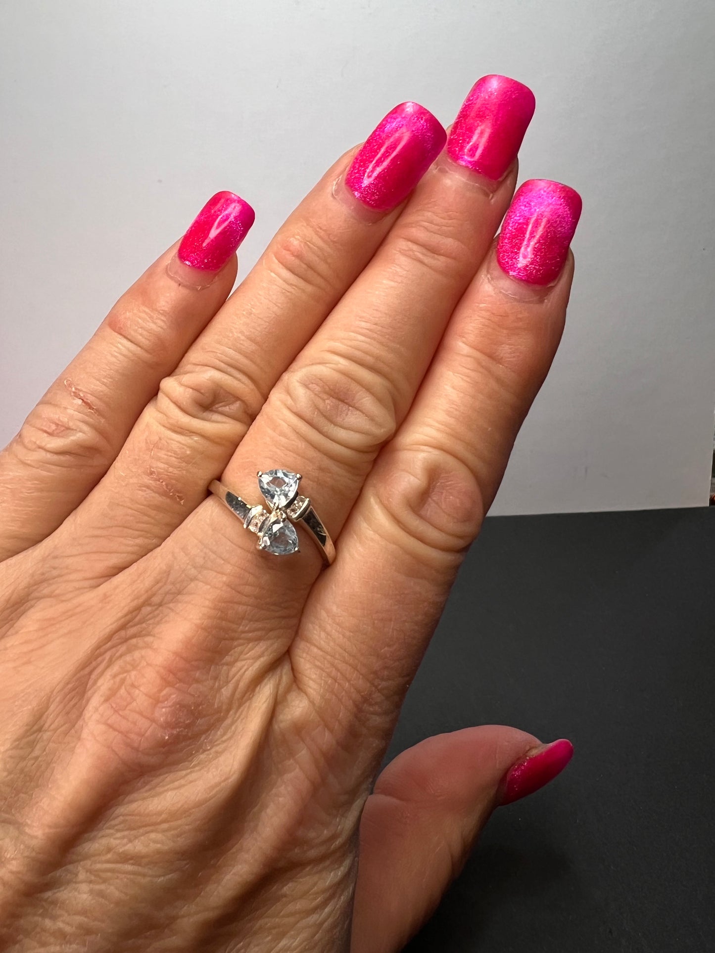 Trillium cut blue topaz bypass ring in rhodium over sterling silver size 9