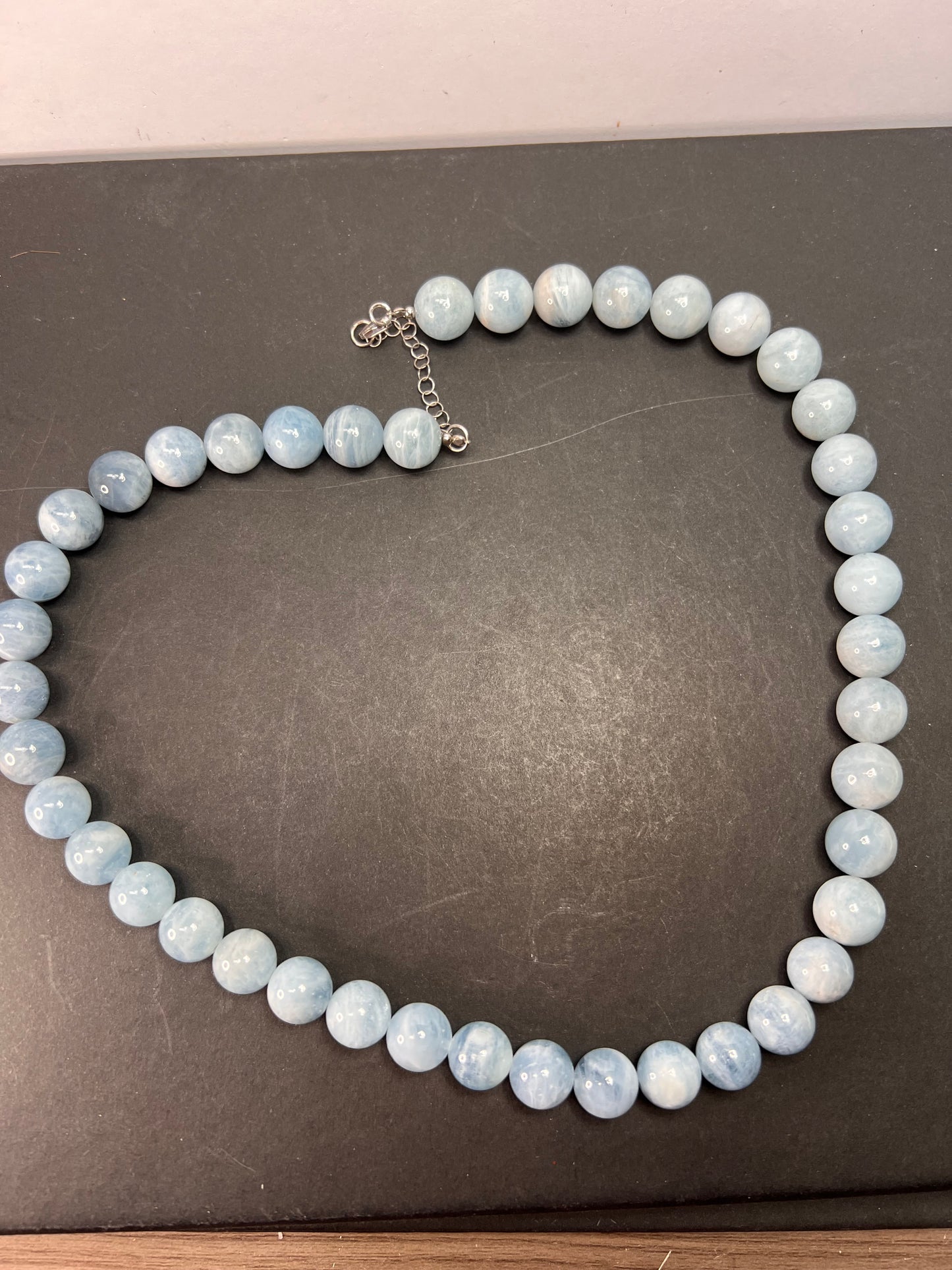 Aquamarine 11mm beaded necklace with sterling silver clasp