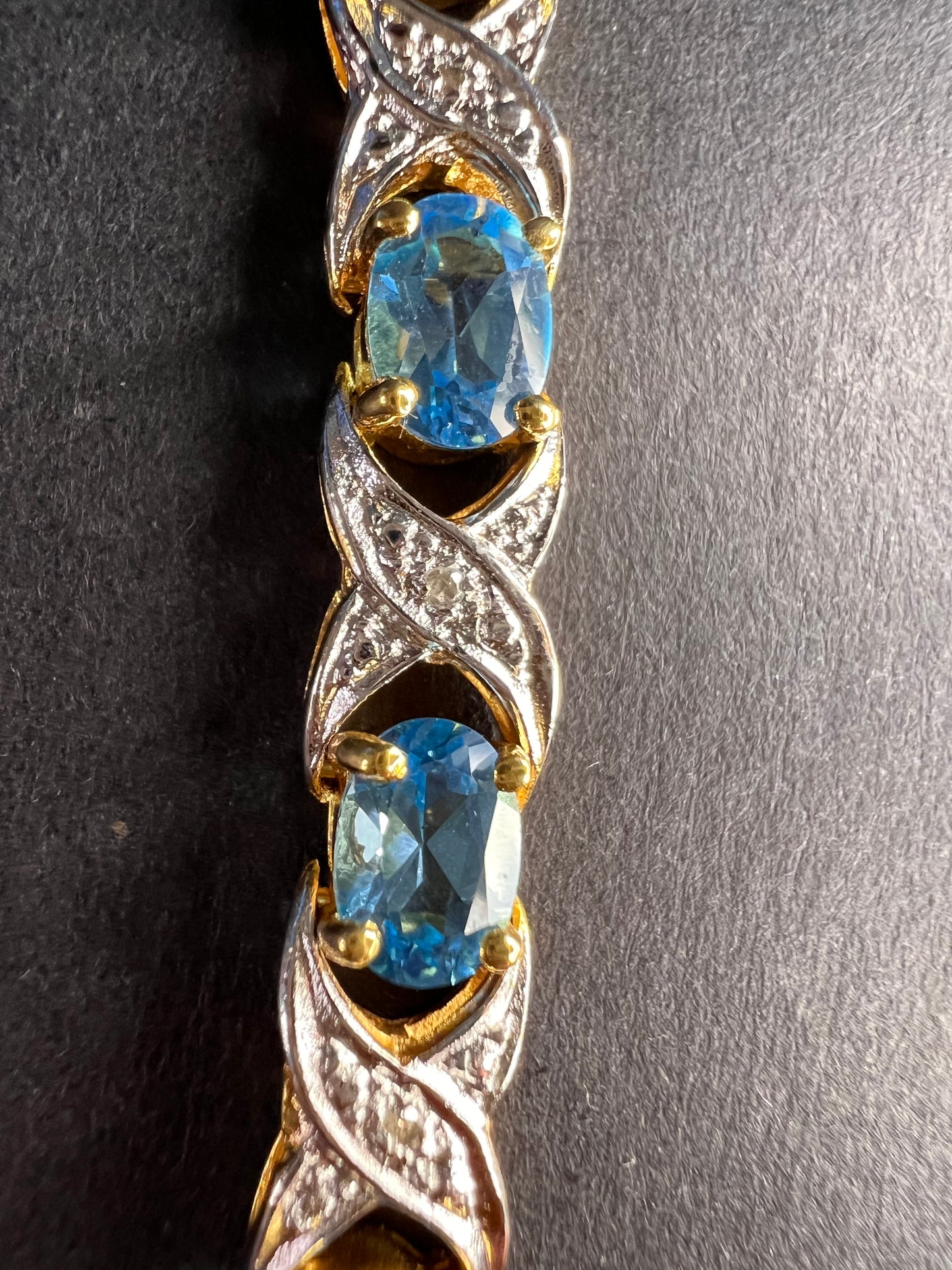 Vintage blue topaz and diamond gold over sterling silver tennis bracelet