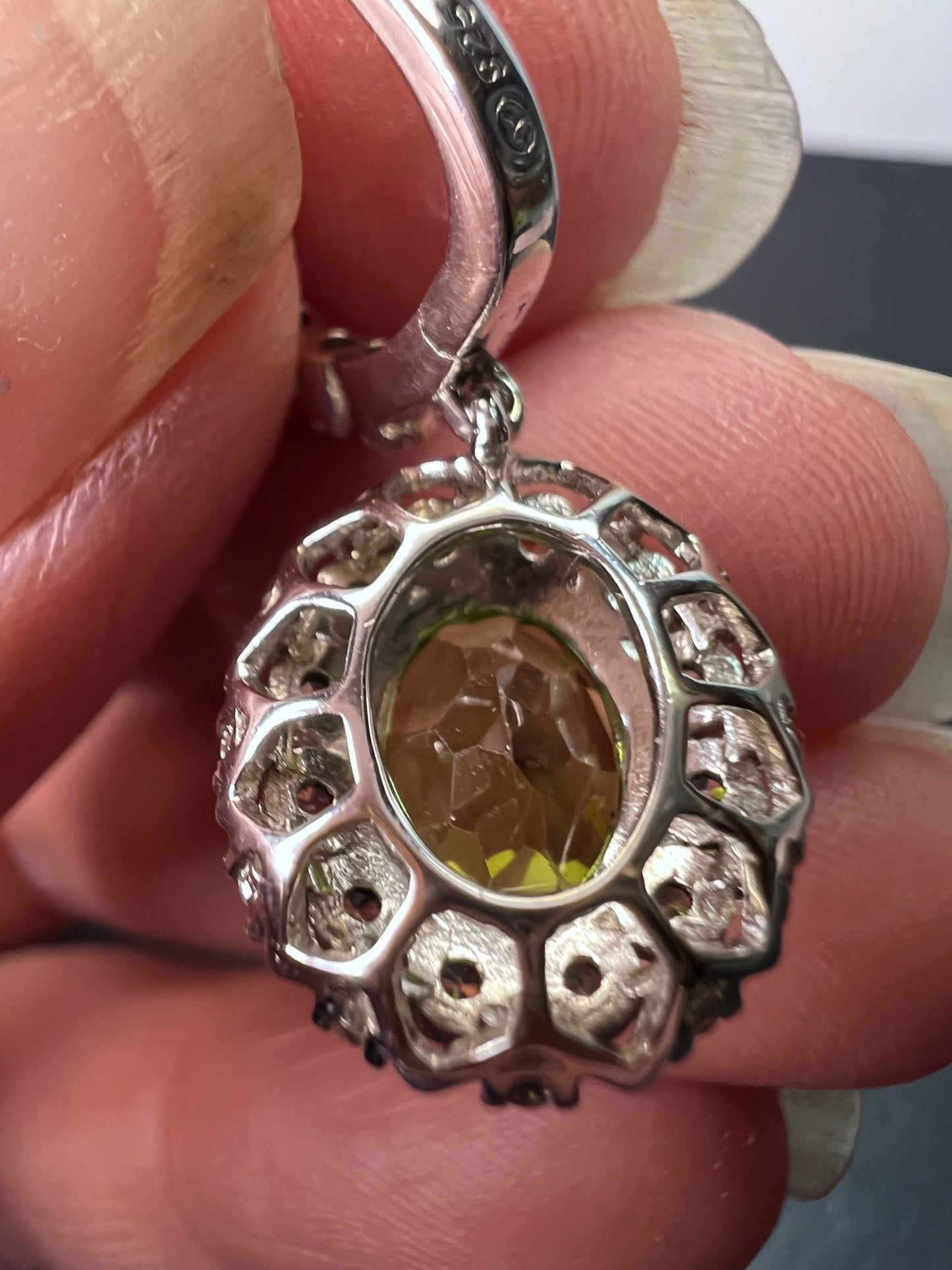 Manchurian Peridot and zircon drop halo earrings in rhodium over sterling silver 5.42 ctw