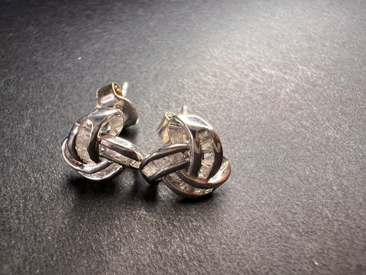 Diamond Celtic knot earrings in platinum over sterling silver .25ctw