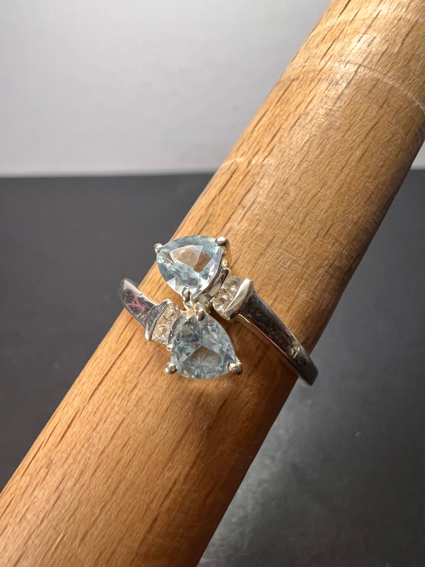 Trillium cut blue topaz bypass ring in rhodium over sterling silver size 9