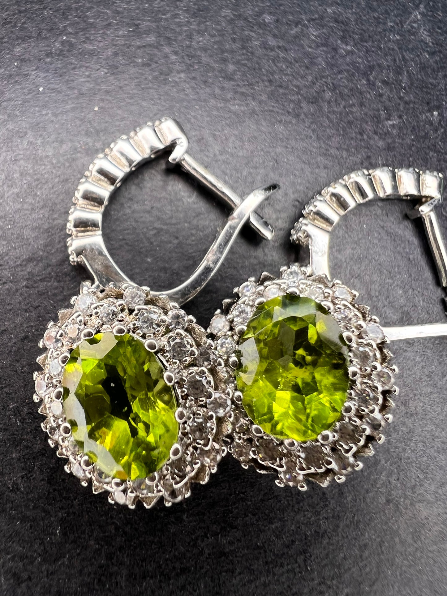 Manchurian Peridot and zircon drop halo earrings in rhodium over sterling silver 5.42 ctw