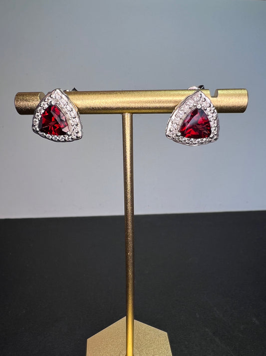 Garnet halo rhodium over sterling stud earrings