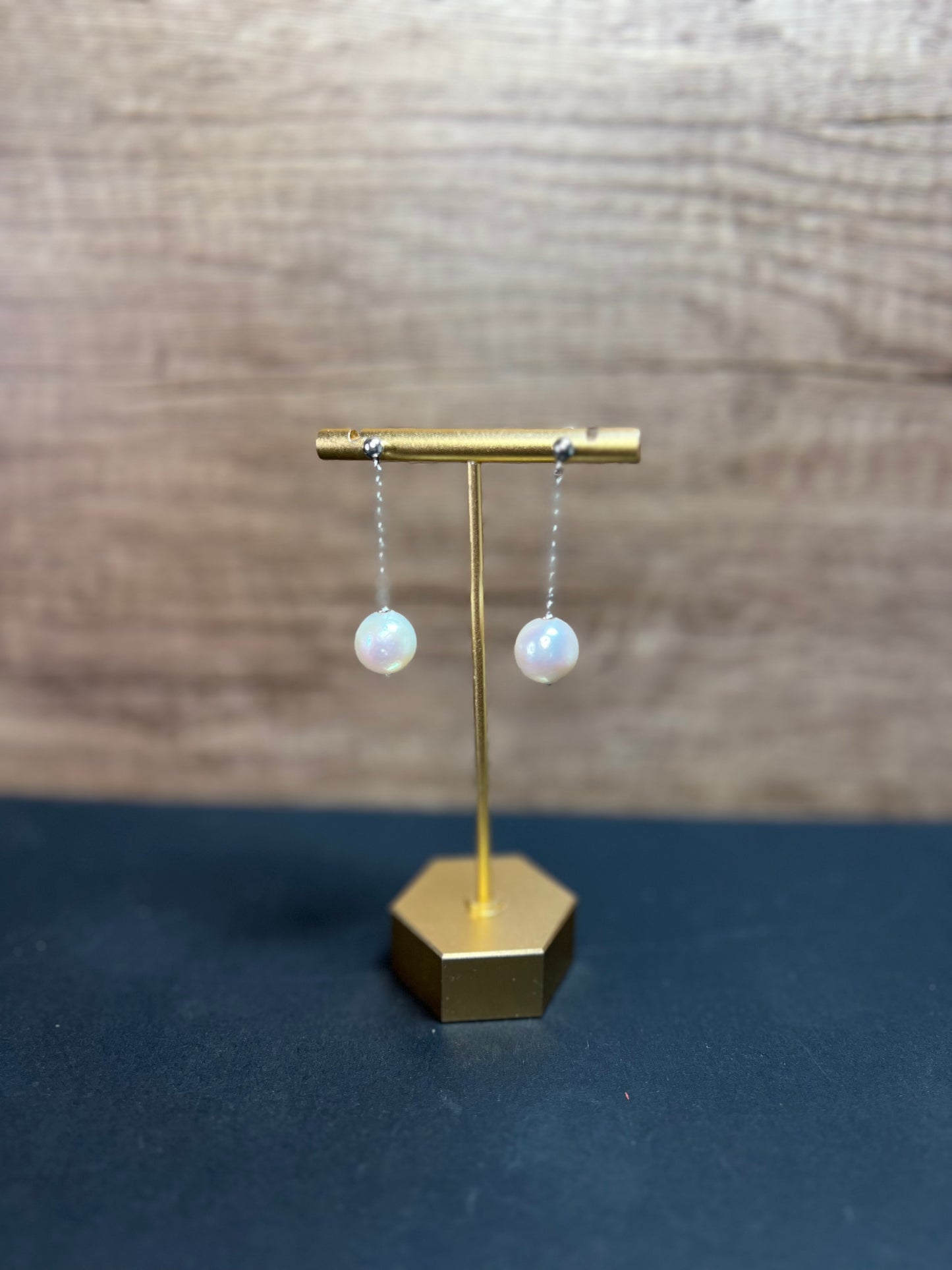 12mm white cultured pearl dangle earrings in sterling silver