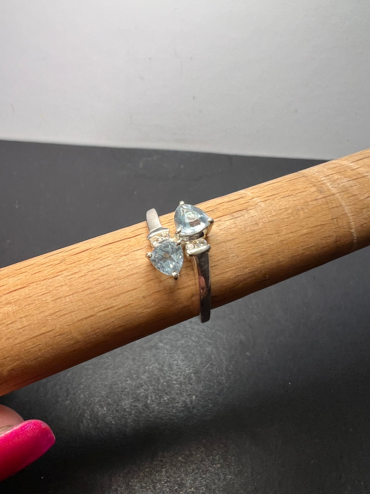 Trillium cut blue topaz bypass ring in rhodium over sterling silver size 9