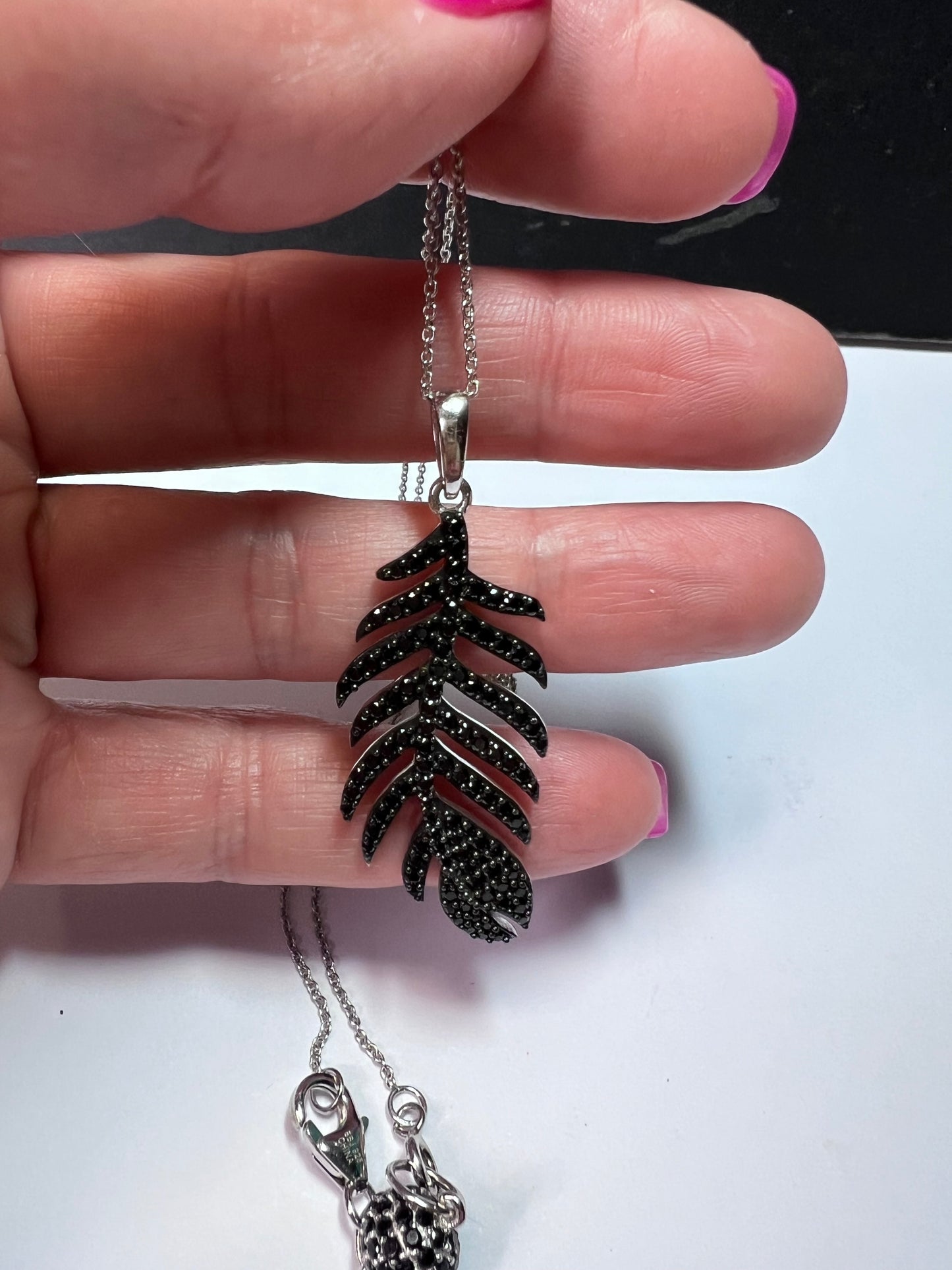 1.69ctw Round Black Spinel Sterling Silver Feather Pendant With 18 inch Chain .