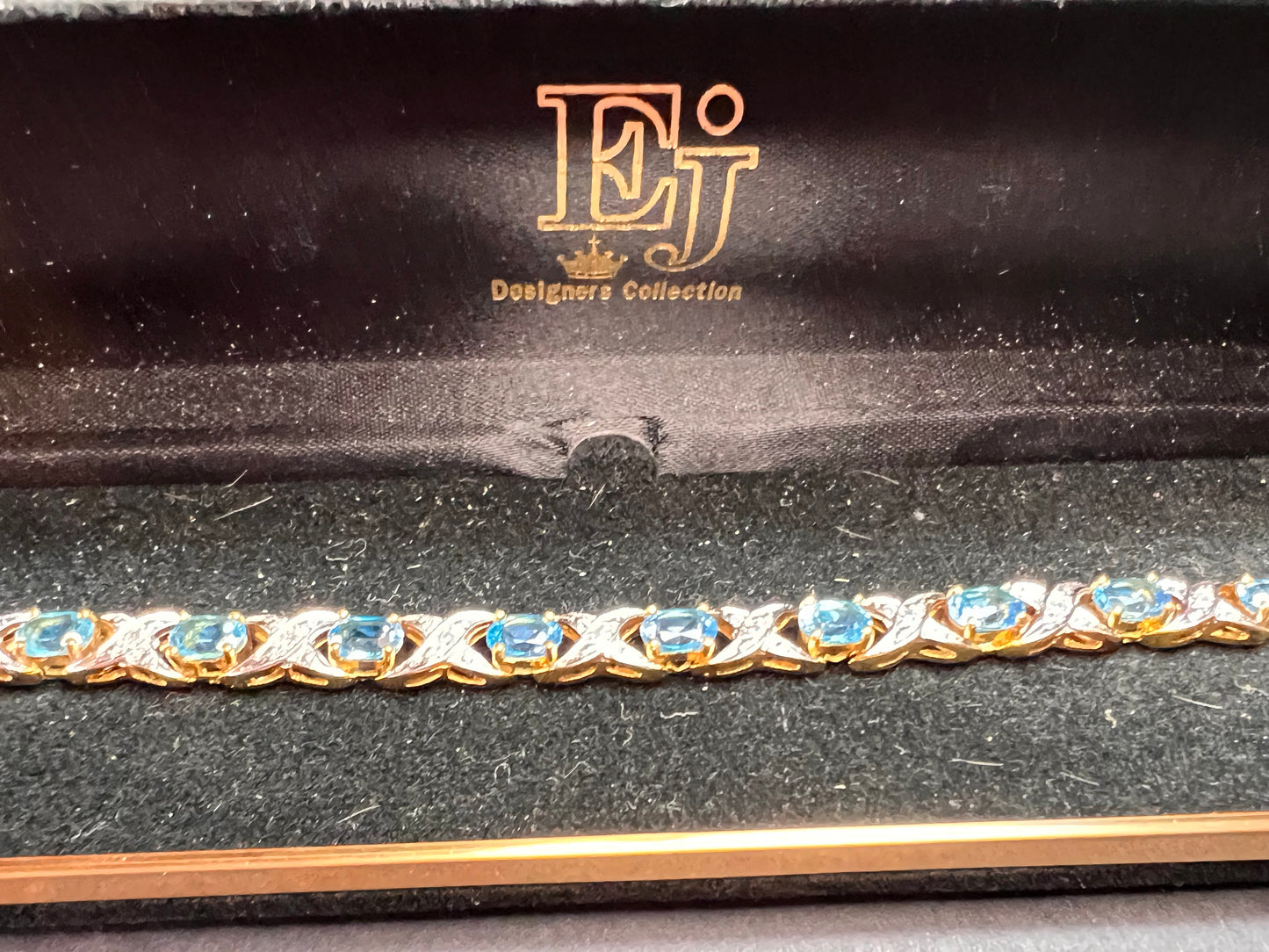 Vintage blue topaz and diamond gold over sterling silver tennis bracelet
