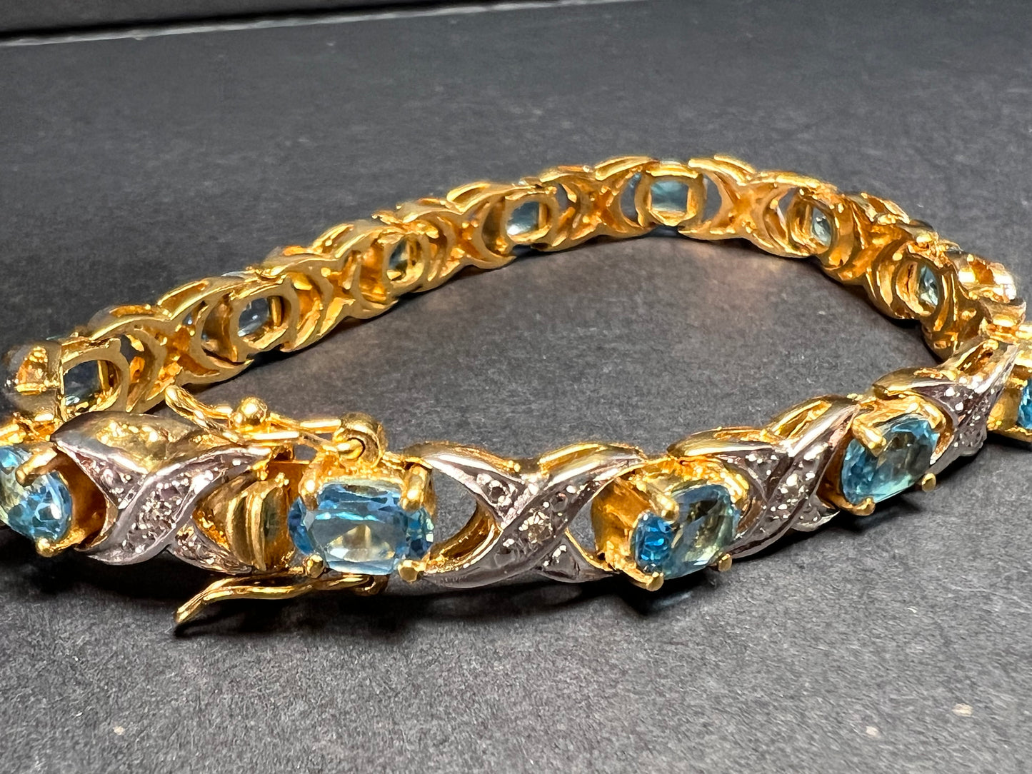 Vintage blue topaz and diamond gold over sterling silver tennis bracelet