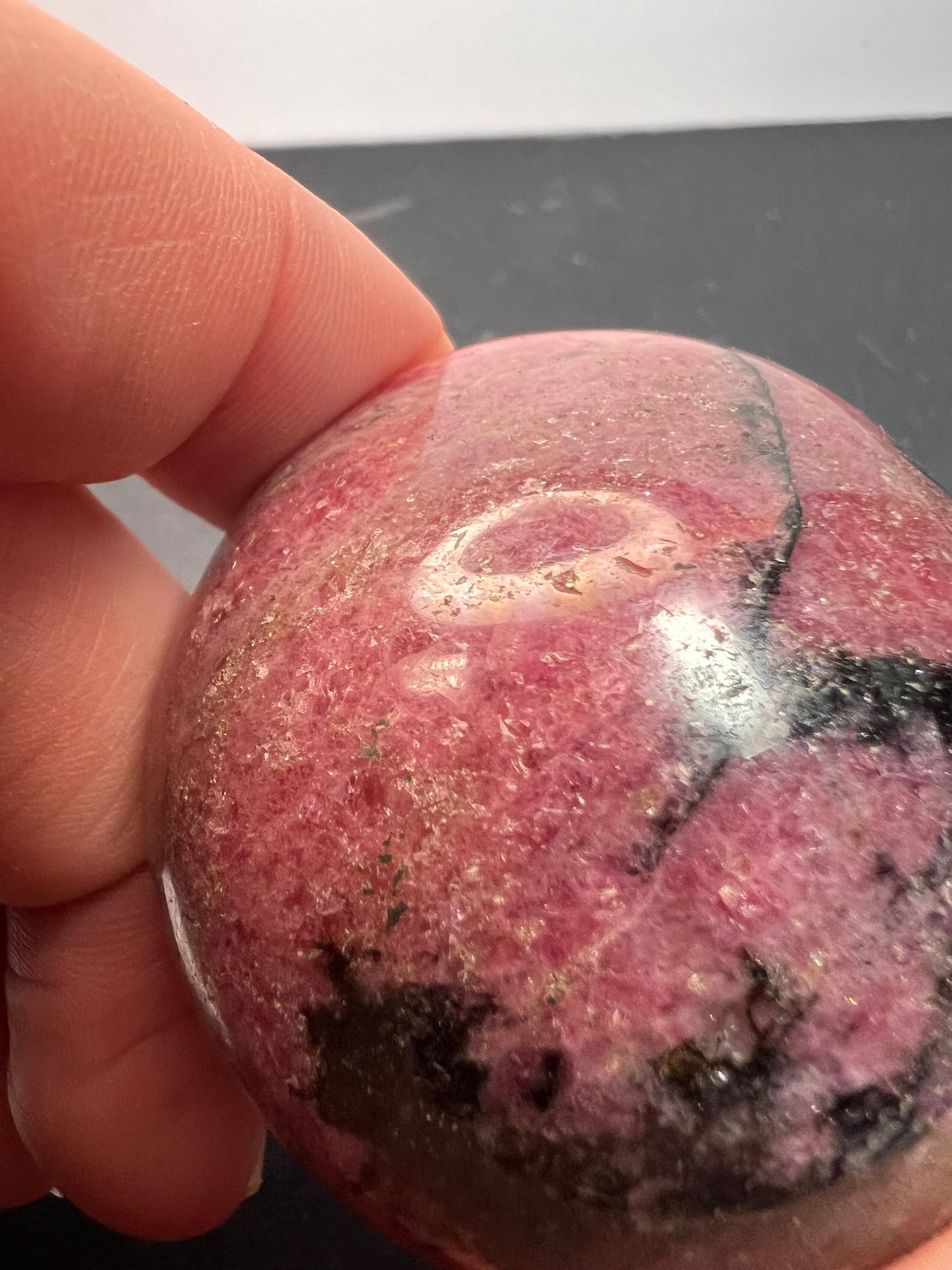 Rhodonite palm stone