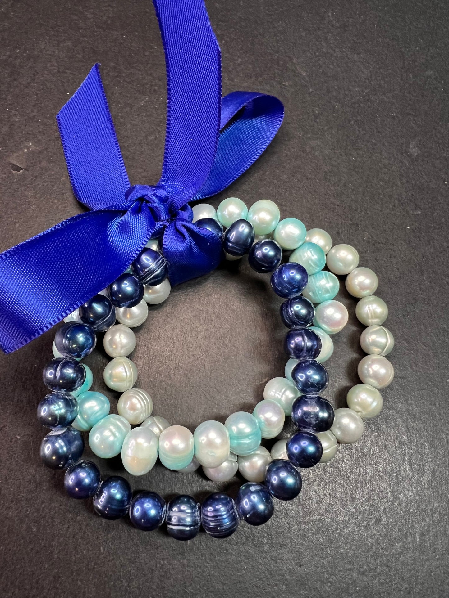 Set of three freshwater pearl shades of blue stretch bracelets