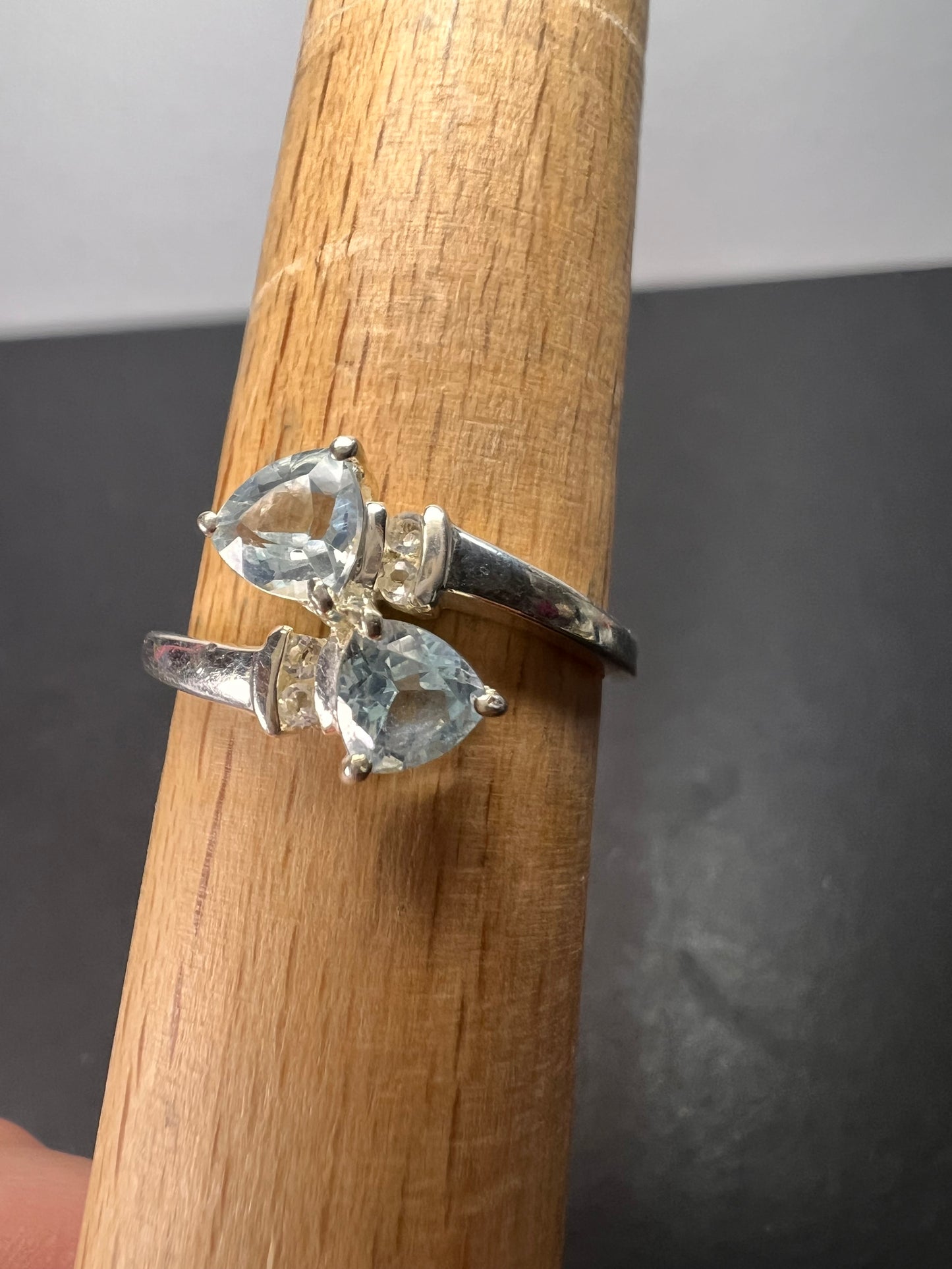 Trillium cut blue topaz bypass ring in rhodium over sterling silver size 9