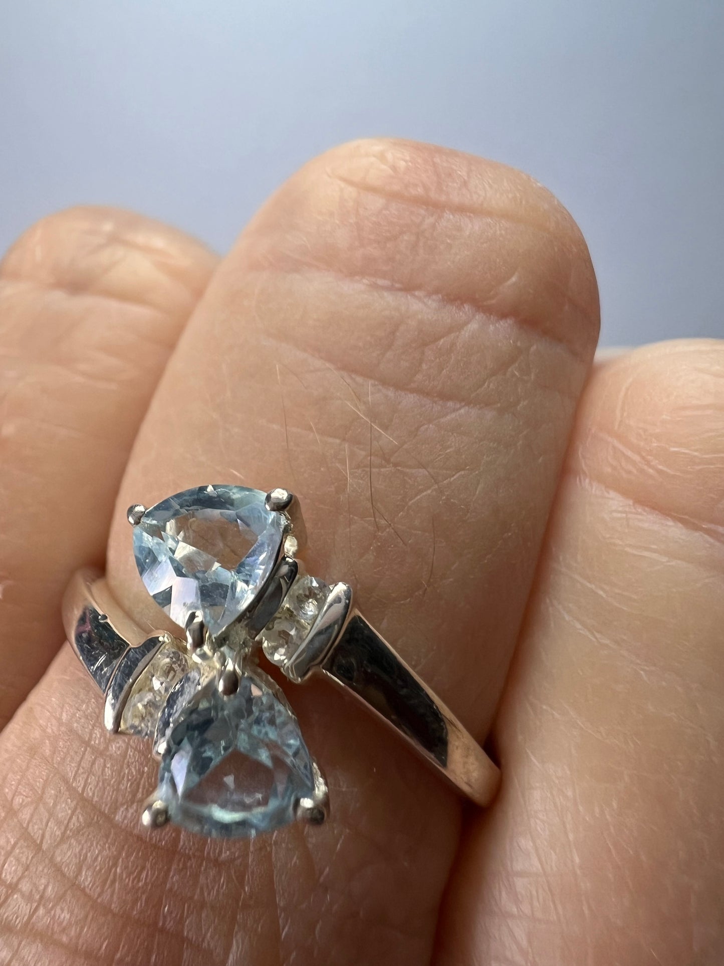 Trillium cut blue topaz bypass ring in rhodium over sterling silver size 9
