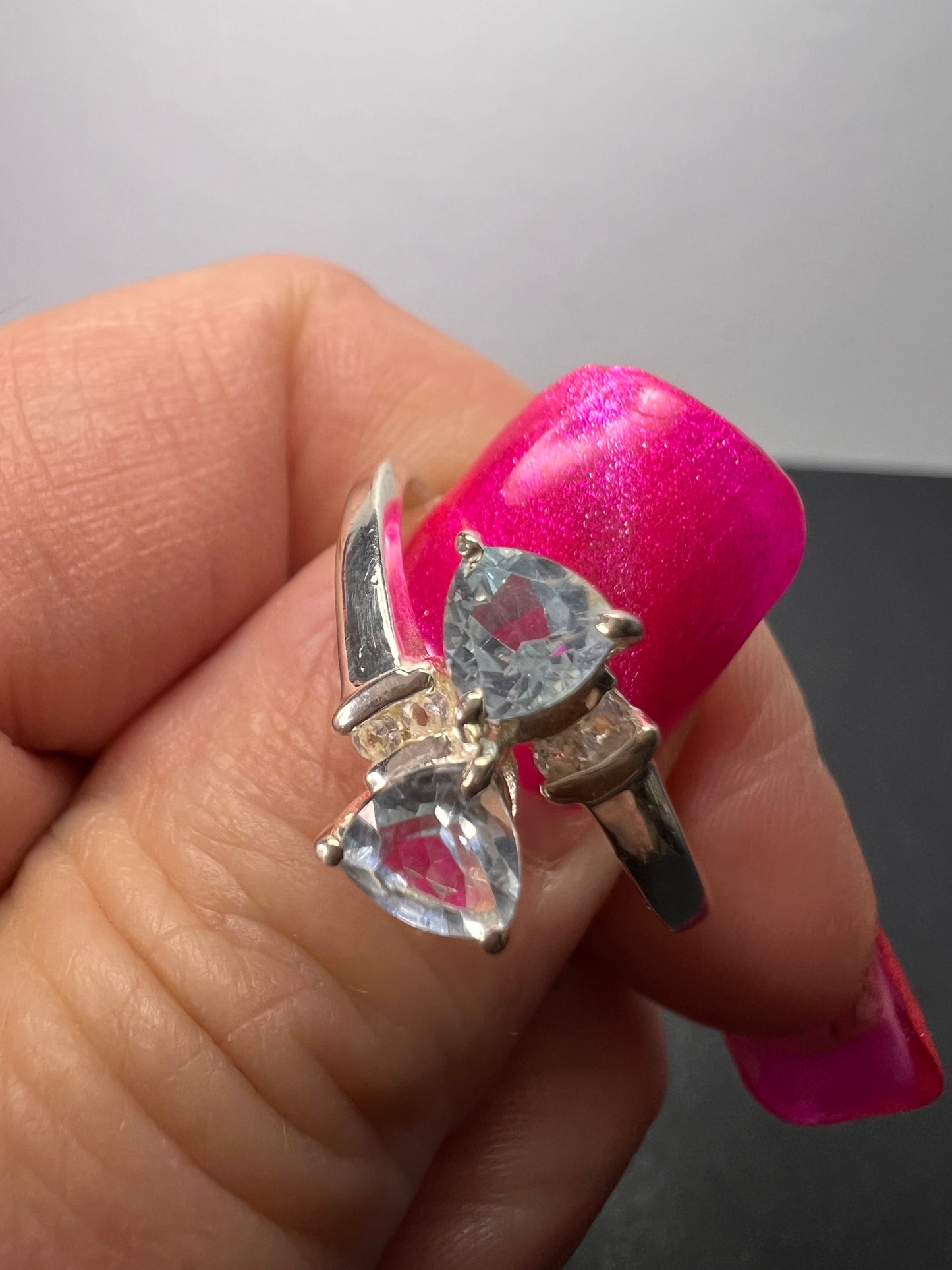 Trillium cut blue topaz bypass ring in rhodium over sterling silver size 9