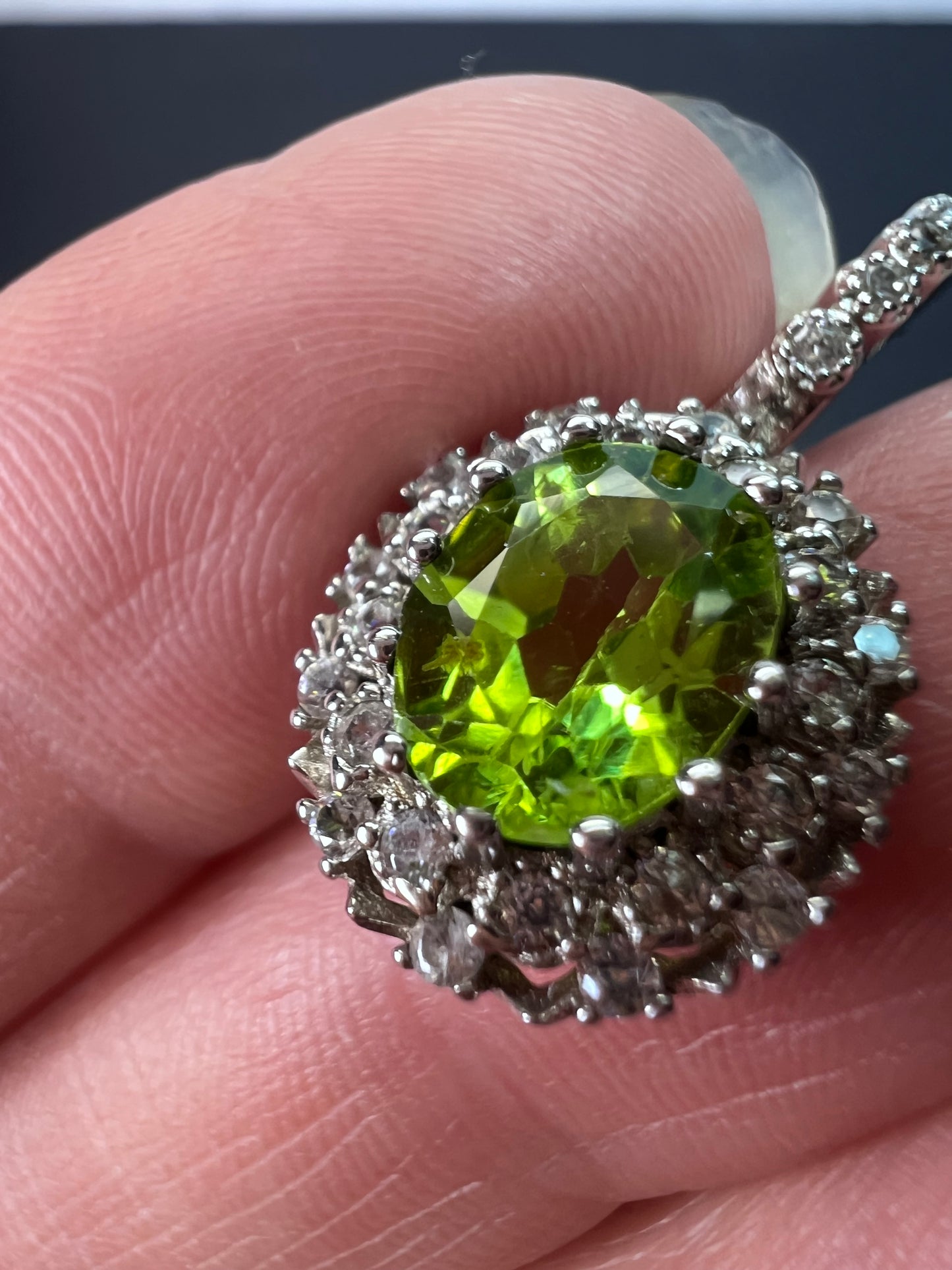 Manchurian Peridot and zircon drop halo earrings in rhodium over sterling silver 5.42 ctw