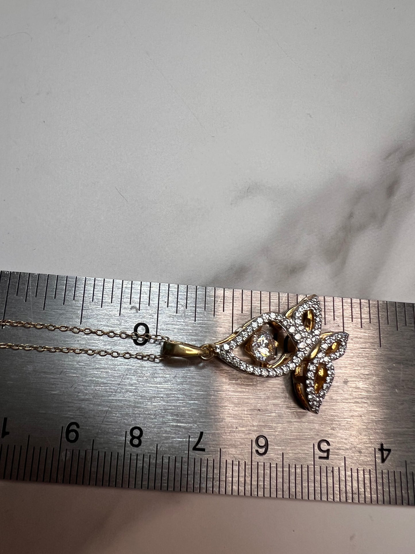 Butterfly CZ pendant in YG over sterling silver with 18 inch chain