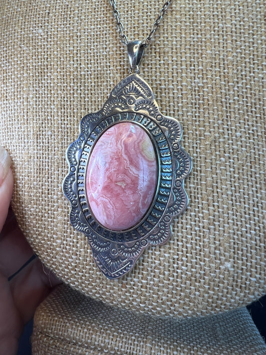 Rhodochrosite and stamped sterling silver southwestern style pendant and 20 inch cable link chain