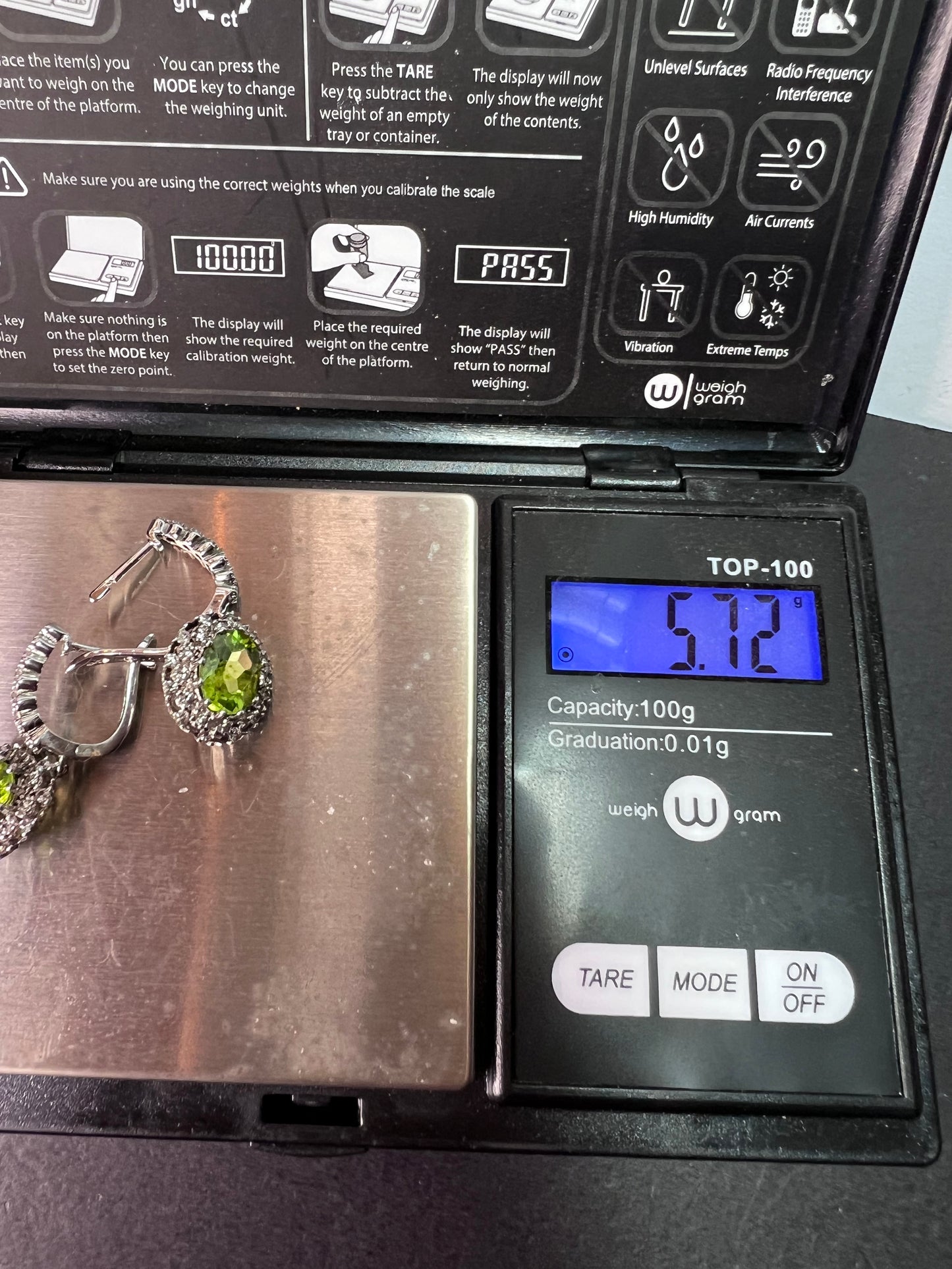 Manchurian Peridot and zircon drop halo earrings in rhodium over sterling silver 5.42 ctw