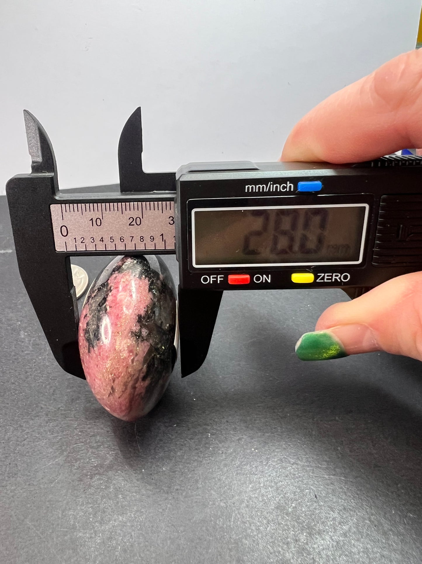 Rhodonite palm stone