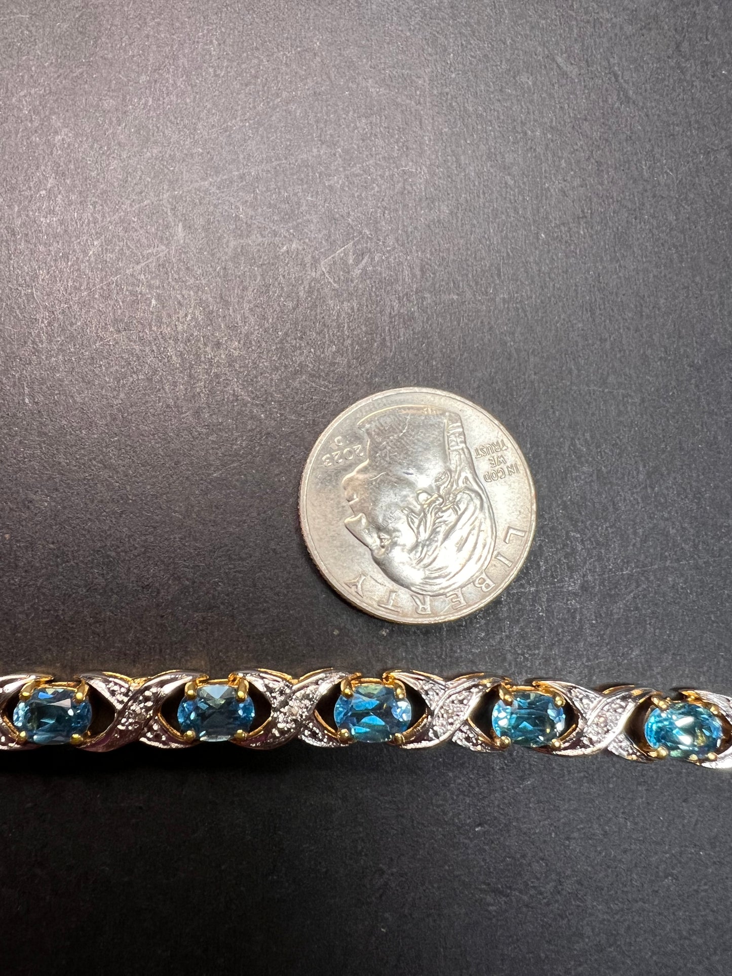 Vintage blue topaz and diamond gold over sterling silver tennis bracelet