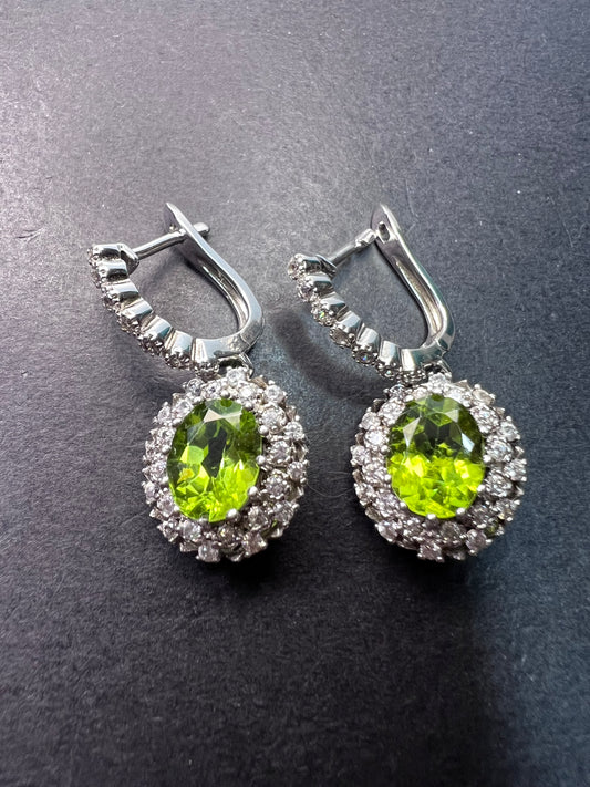 Manchurian Peridot and zircon drop halo earrings in rhodium over sterling silver 5.42 ctw