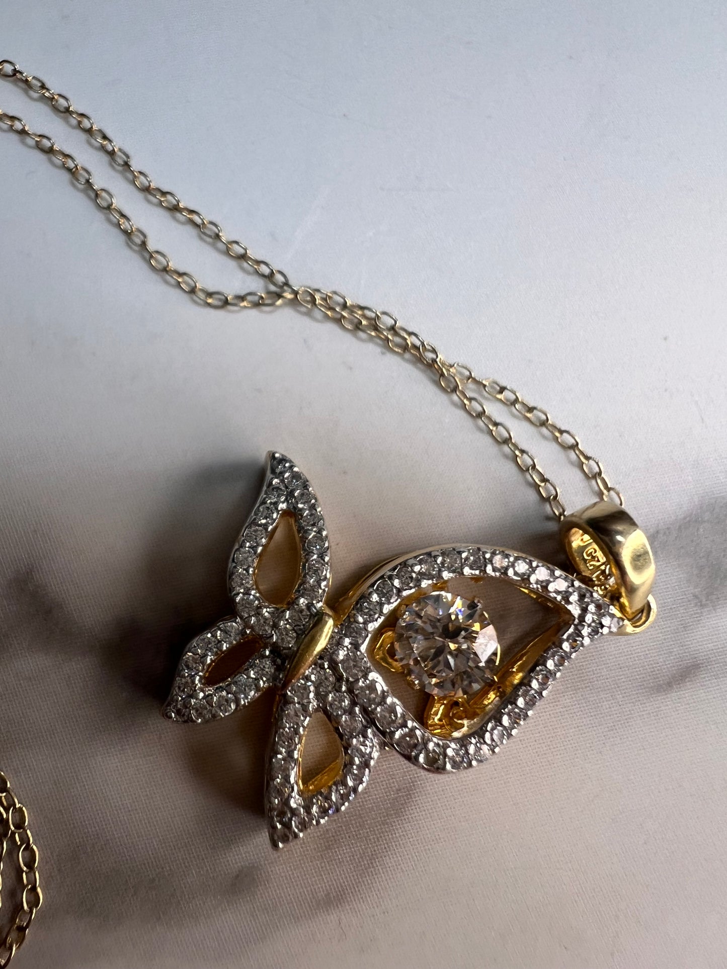 Butterfly CZ pendant in YG over sterling silver with 18 inch chain
