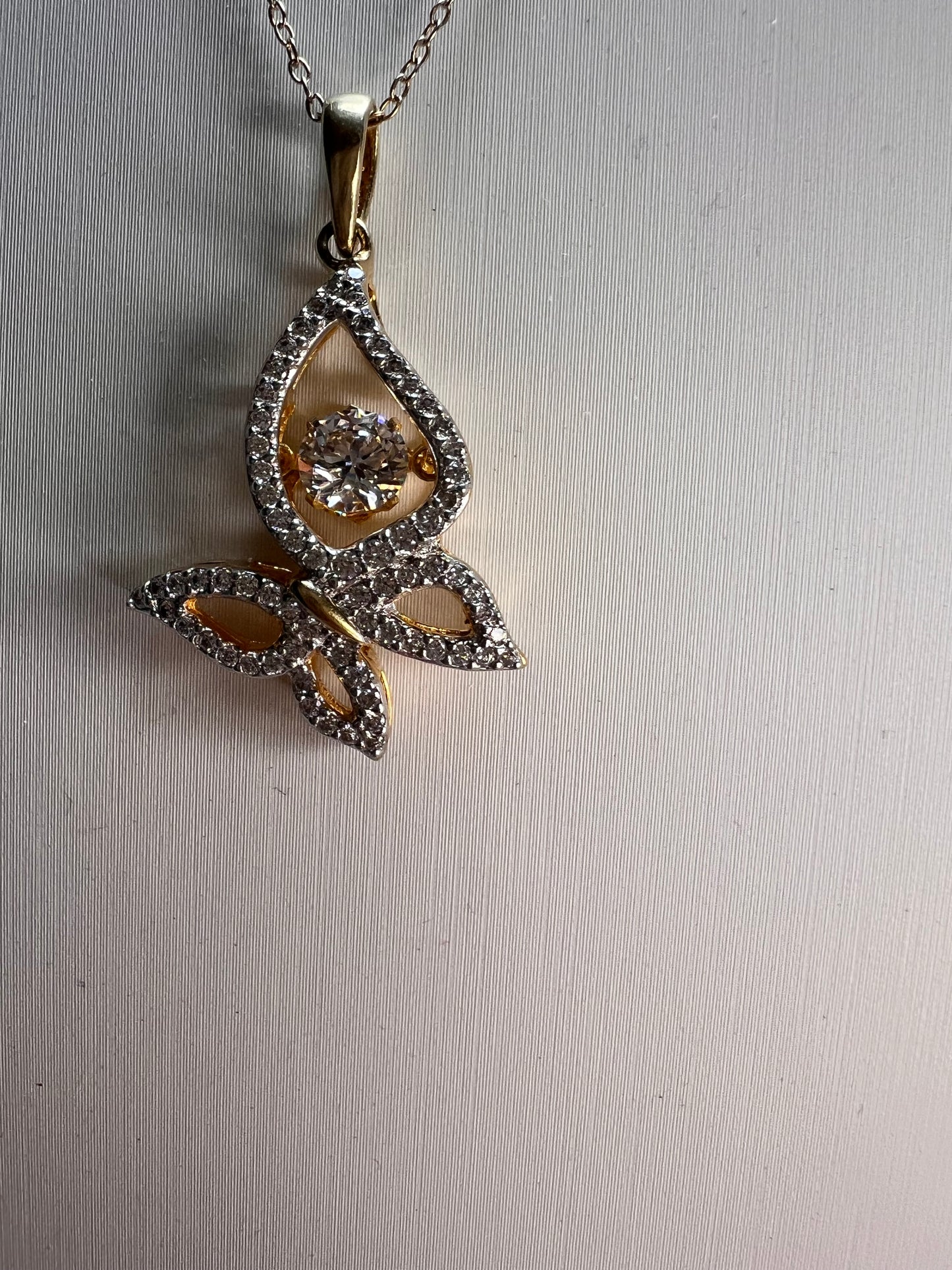 Butterfly CZ pendant in YG over sterling silver with 18 inch chain