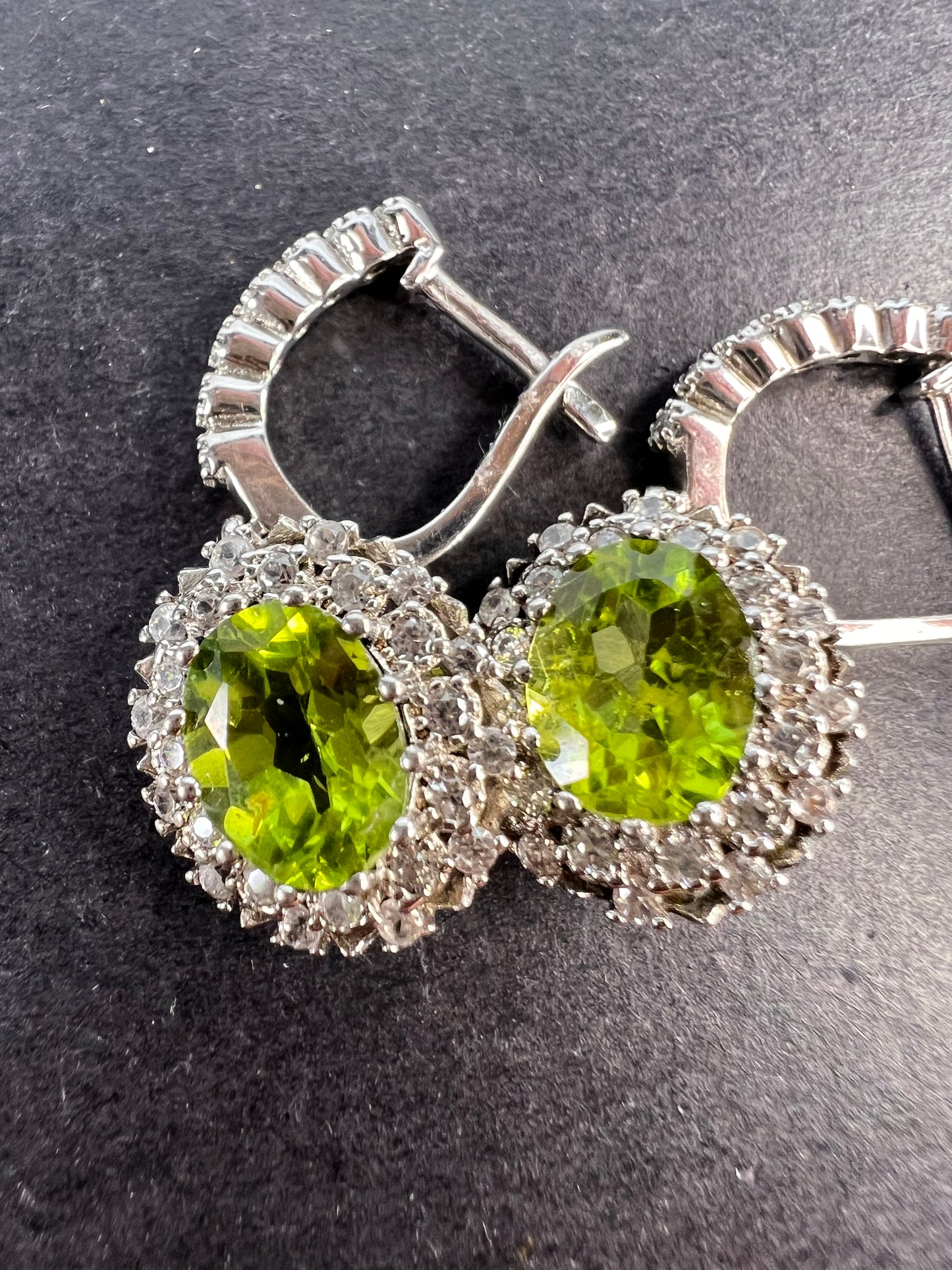 Manchurian Peridot and zircon drop halo earrings in rhodium over sterling silver 5.42 ctw