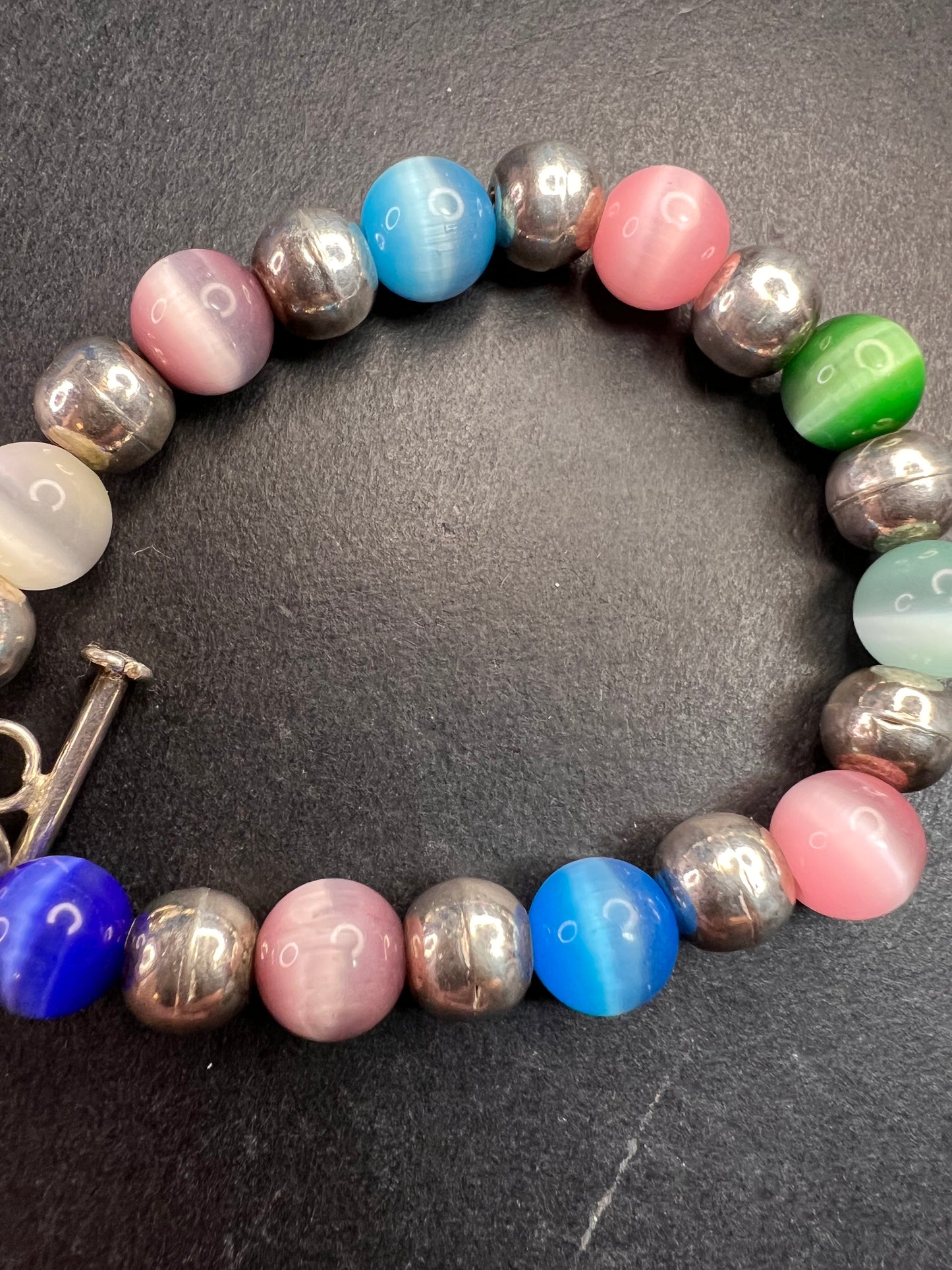 Vintage sterling silver and cats eye glass toggle bracelet