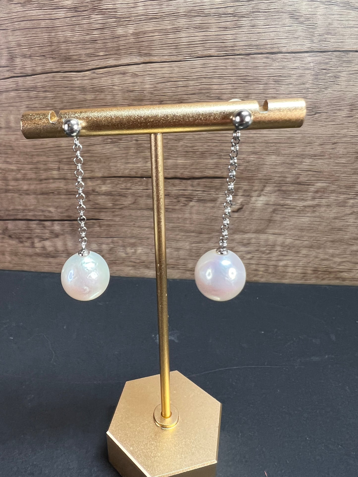 12mm white cultured pearl dangle earrings in sterling silver