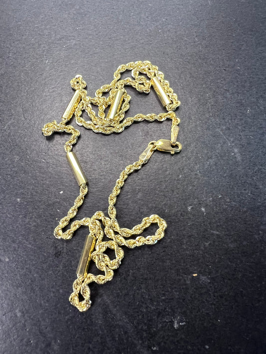 10k yellow gold twisted rope and bar chain. 18 inches