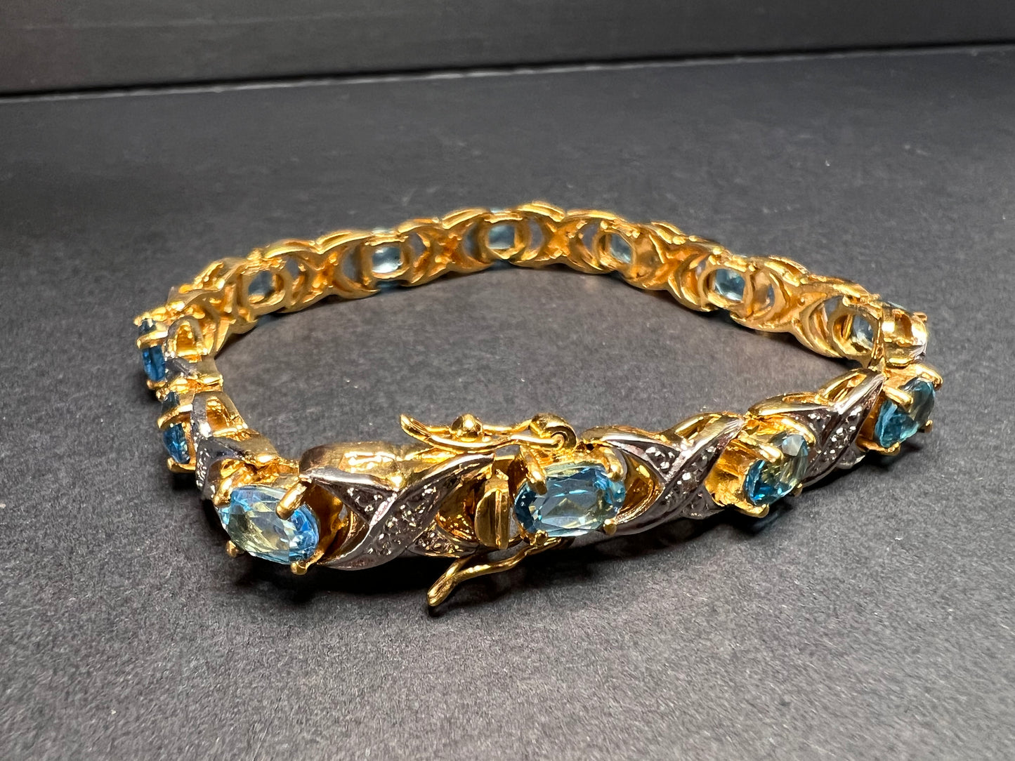 Vintage blue topaz and diamond gold over sterling silver tennis bracelet