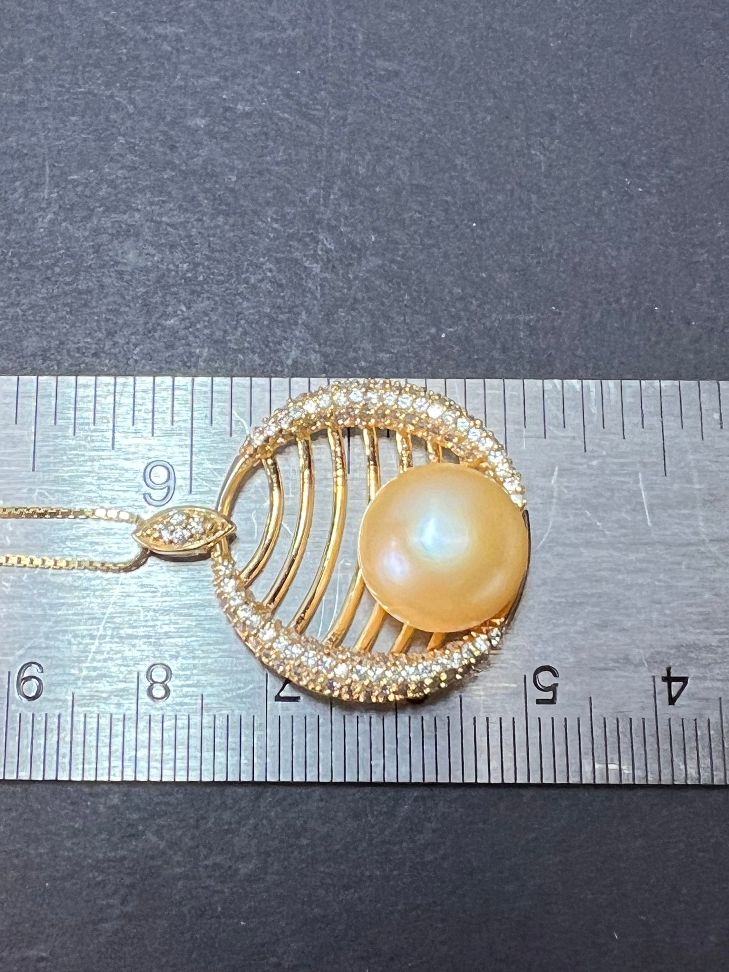 Golden yellow cultured pearl pendant in gold over sterling silver with chain