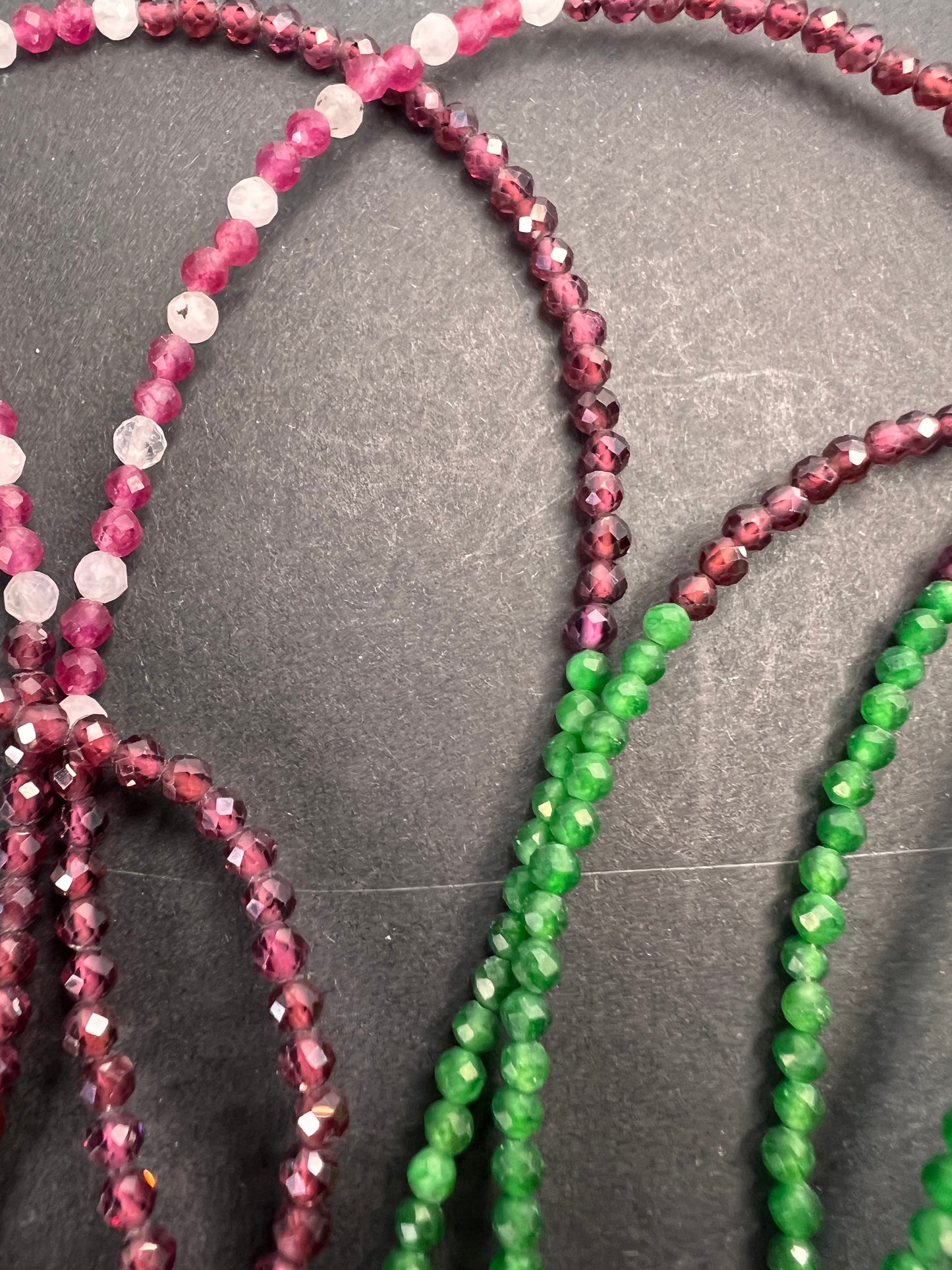 Emerald multi stone three strand necklace 25”