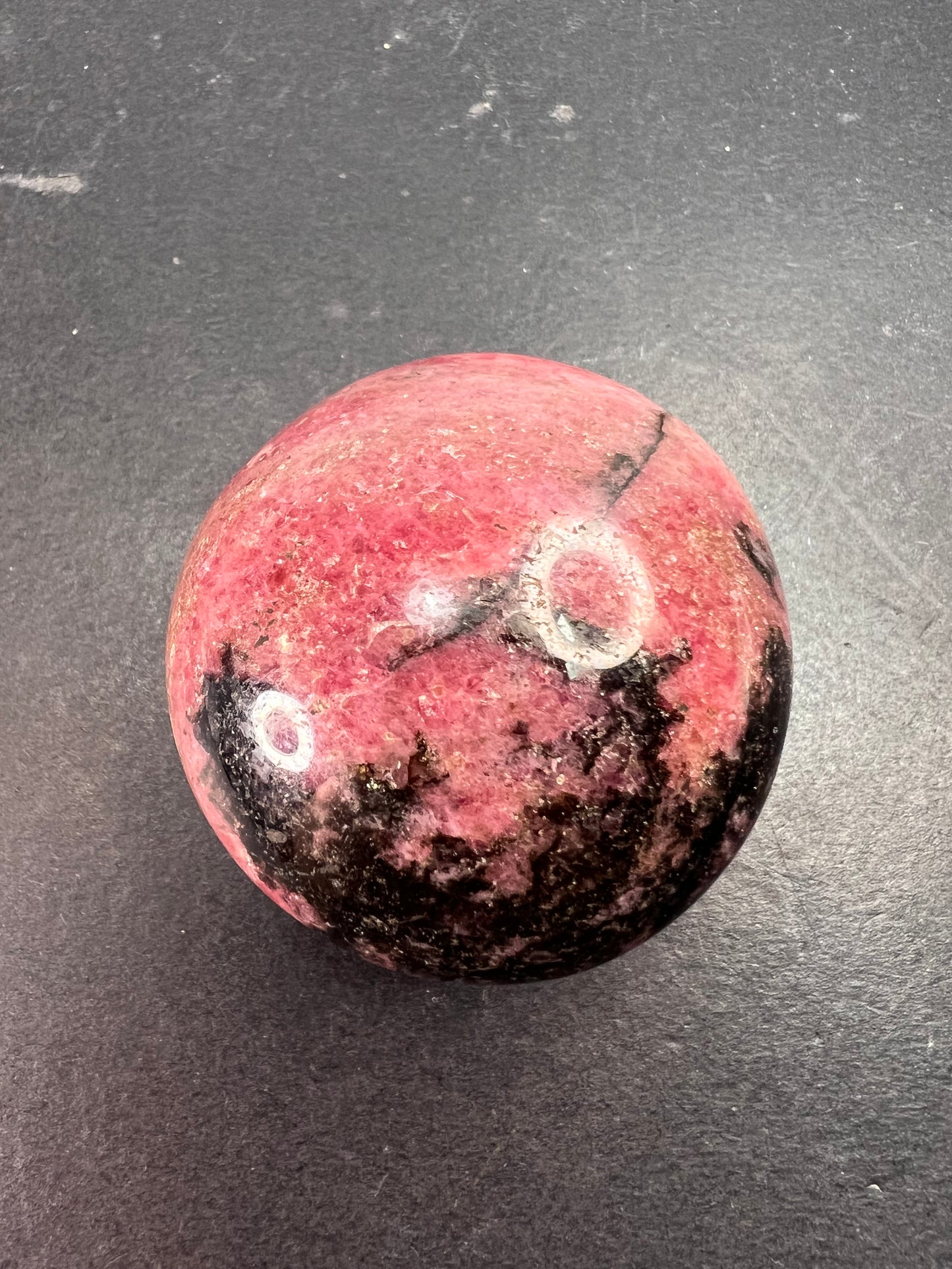 Rhodonite palm stone