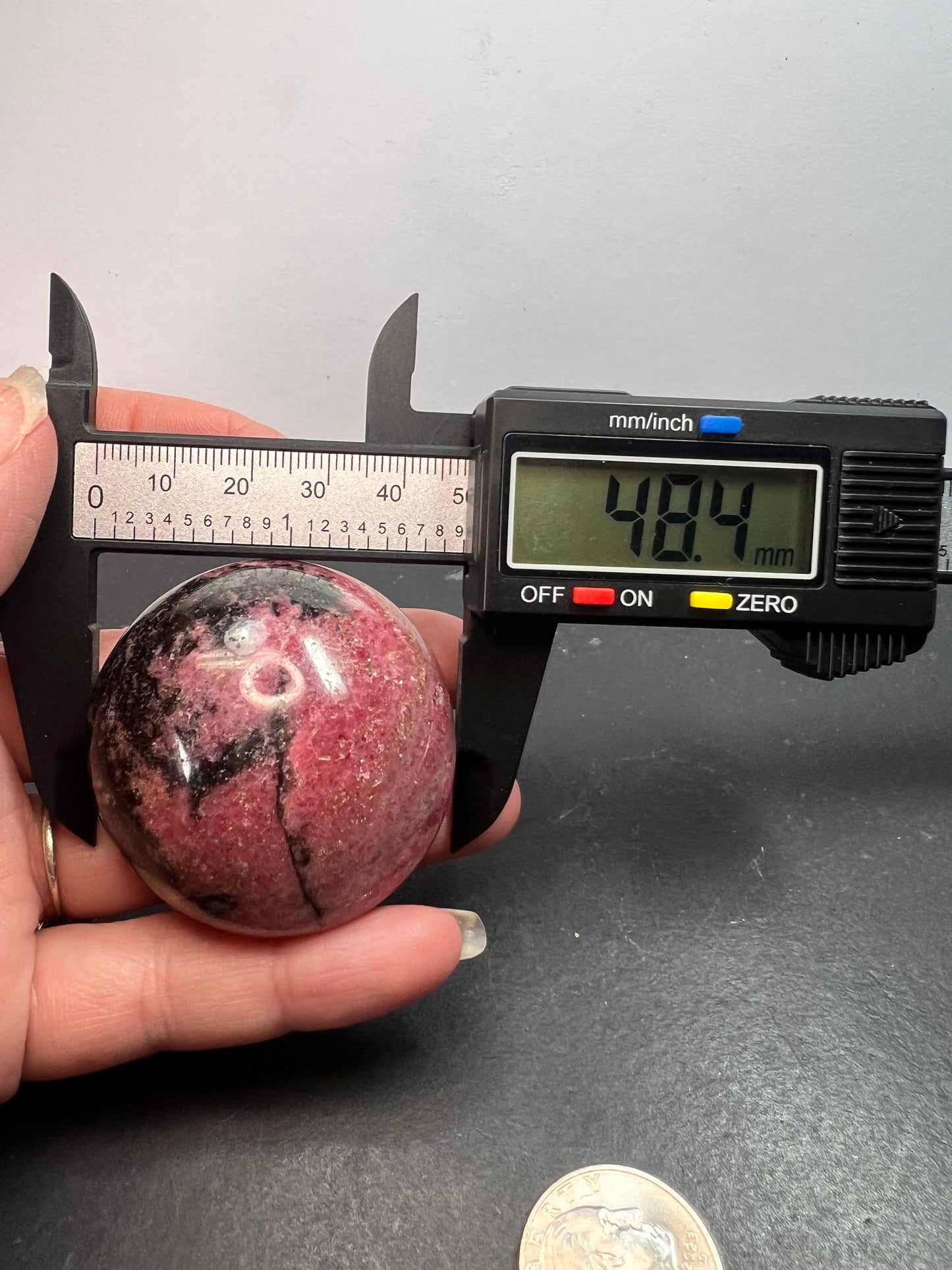 Rhodonite palm stone