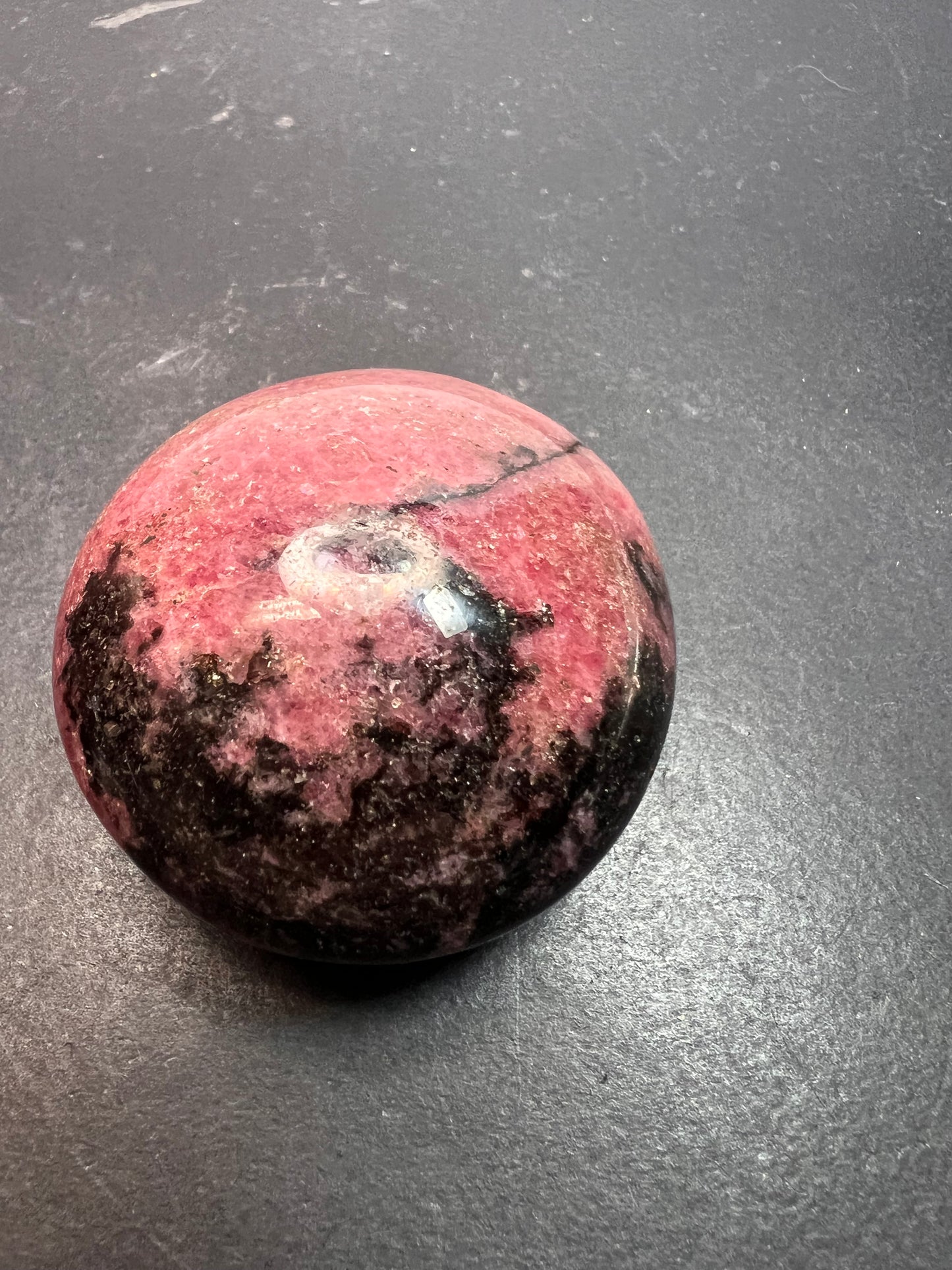 Rhodonite palm stone