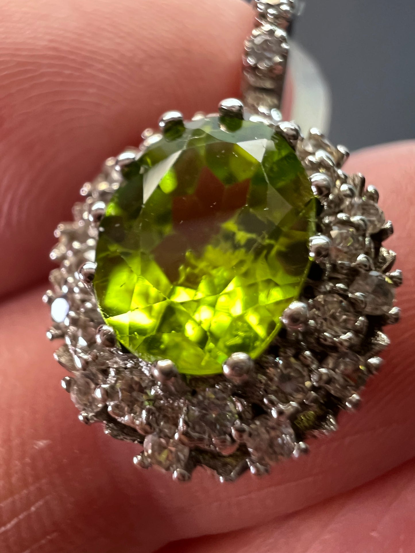 Manchurian Peridot and zircon drop halo earrings in rhodium over sterling silver 5.42 ctw